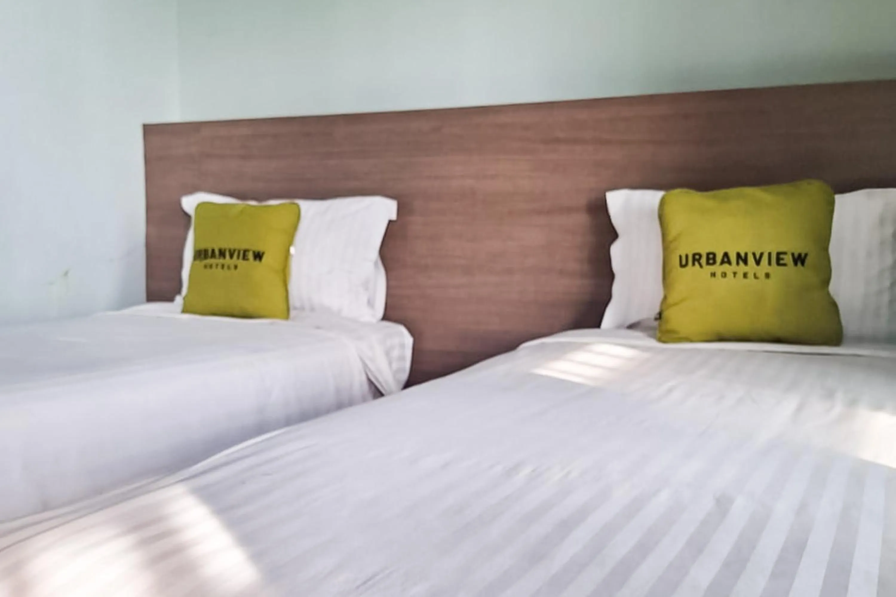 Bedroom, Bed in Urbanview Hotel Gapura Parapat by RedDoorz