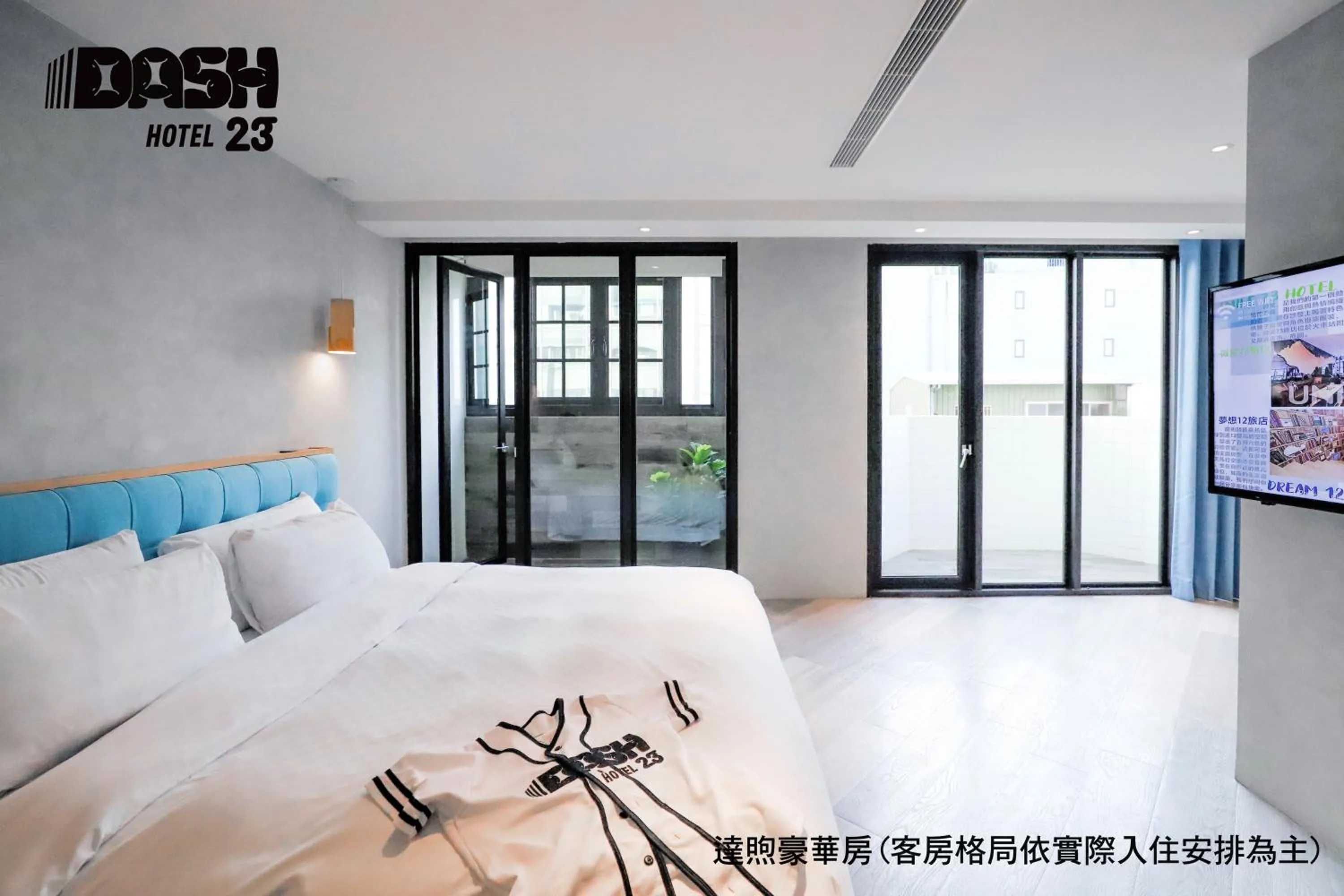 Bed in Dash 23 Hotel