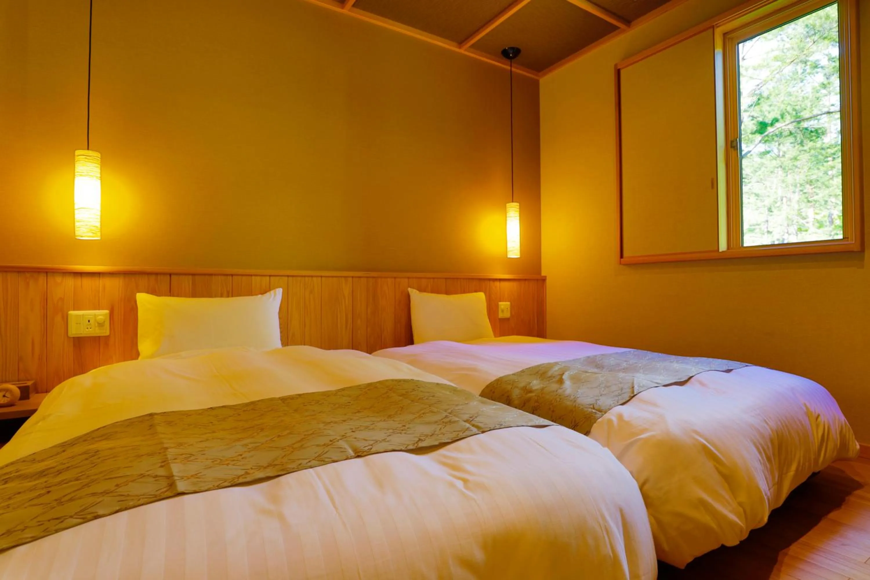 Photo of the whole room, Bed in Yukemuri no Yado Inazumi Onsen