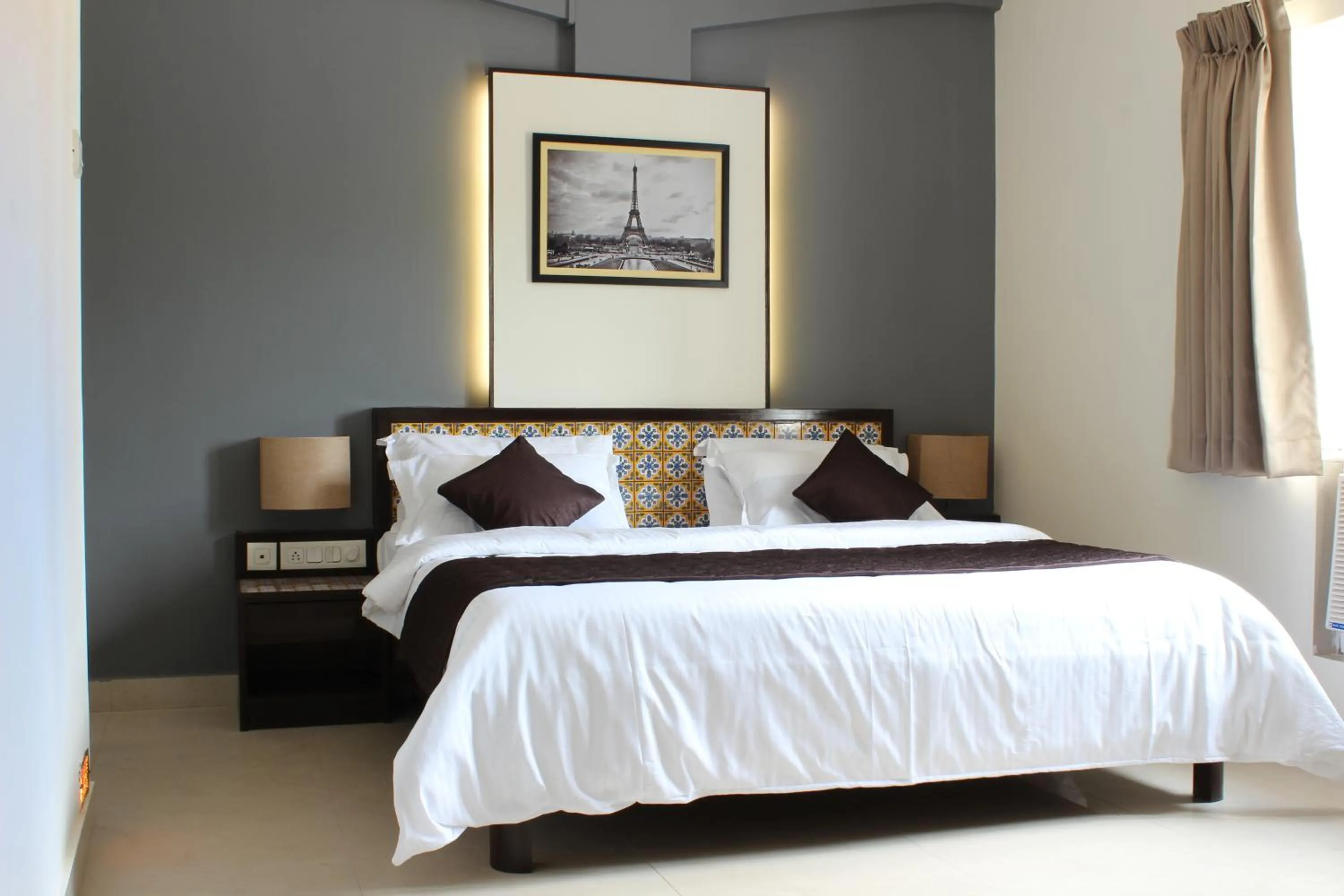 Bed in Ria Residency