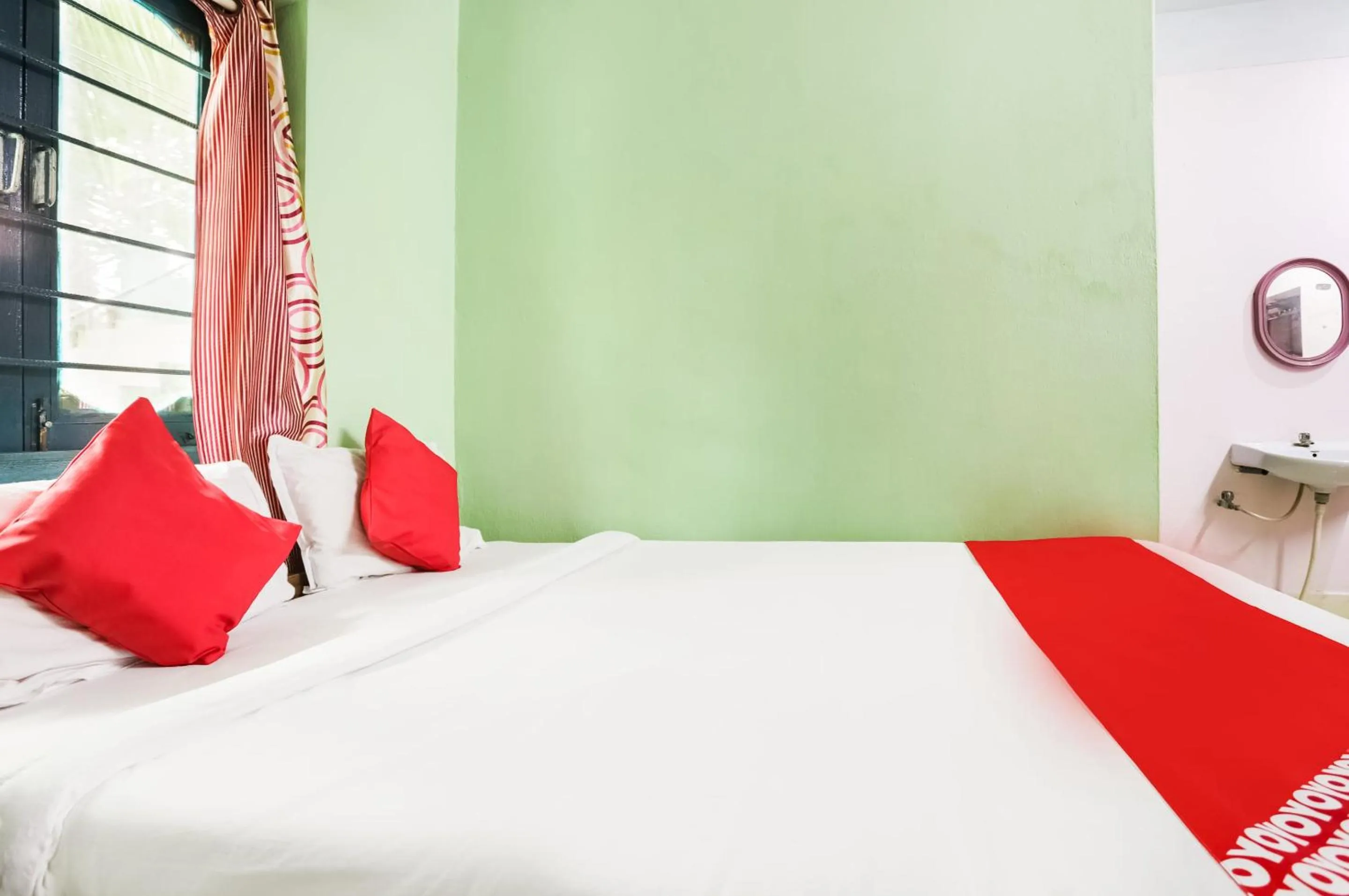 Bedroom in Hotel O Aashna