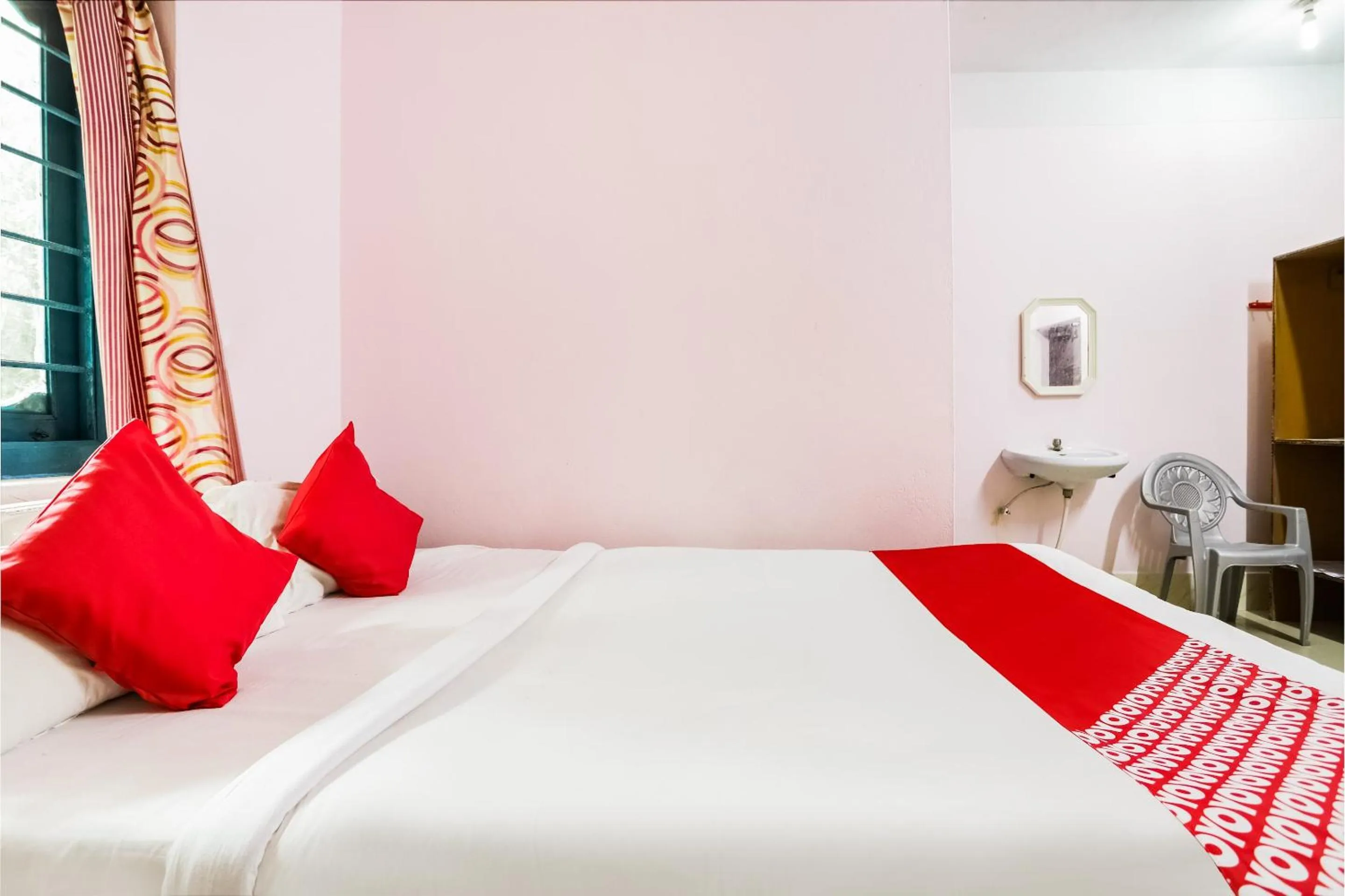 Bedroom in Hotel O Aashna