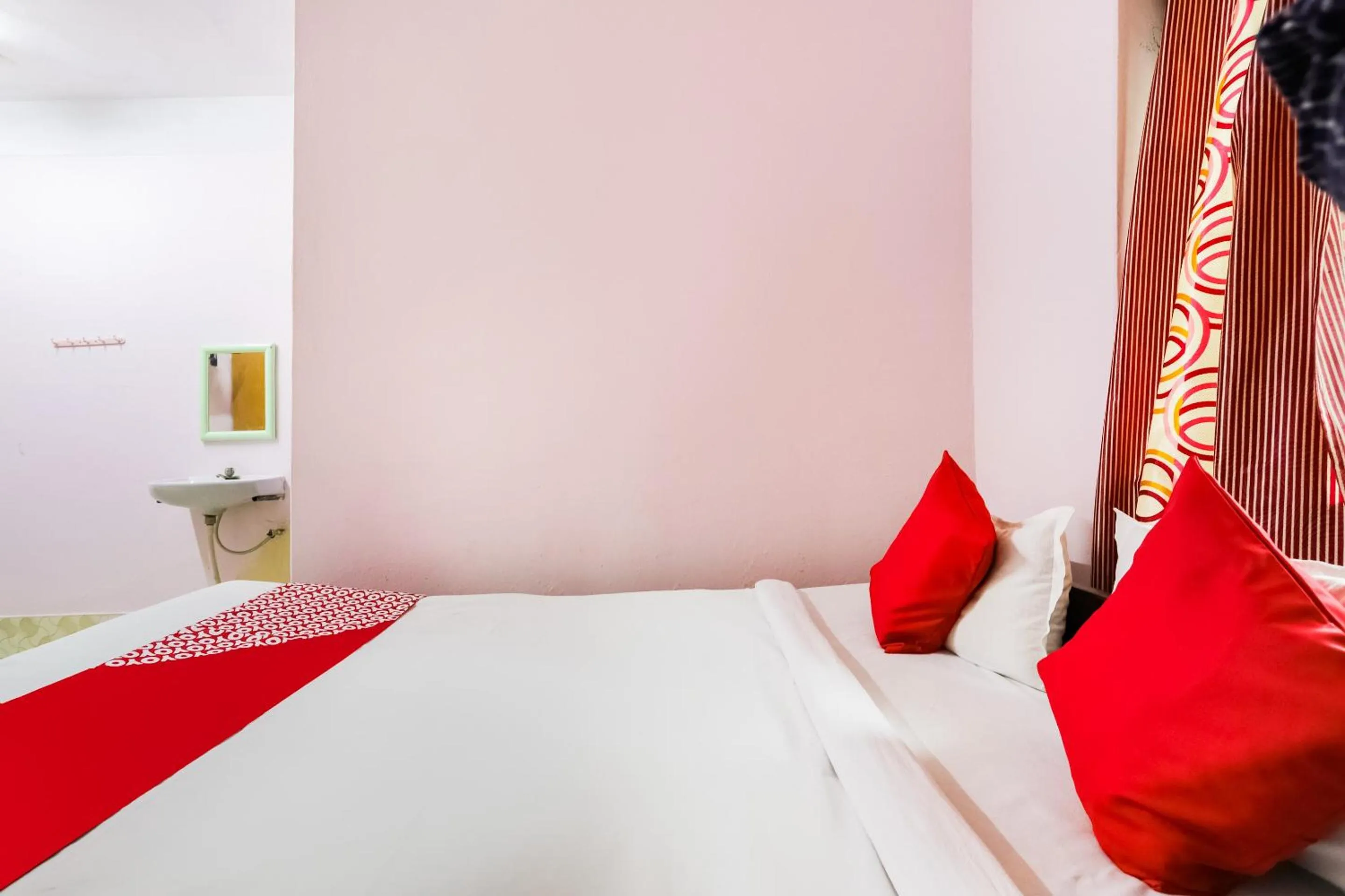 Bedroom in Hotel O Aashna