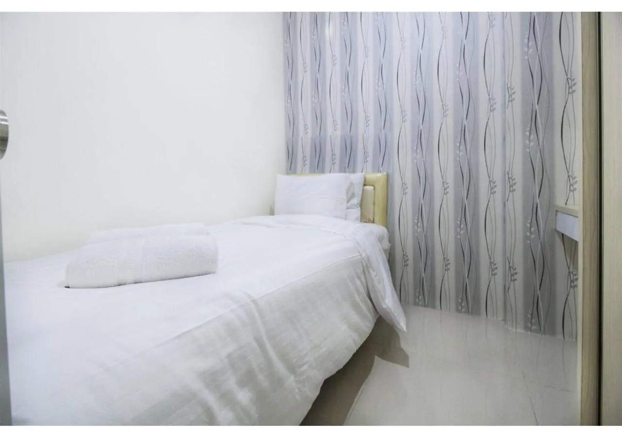 Bedroom in Apartment Green Pramuka by Vincent