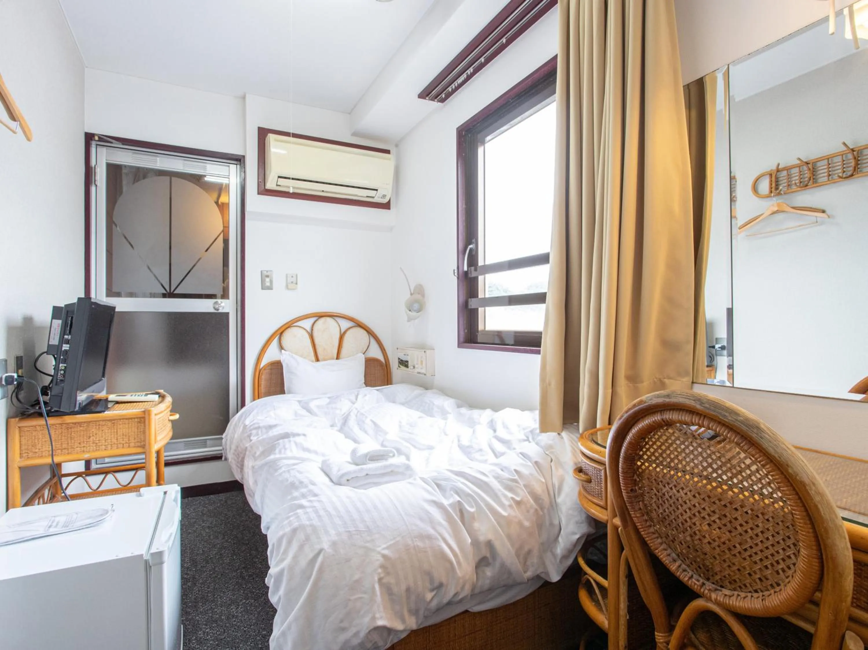 Photo of the whole room, Bed in Tabist New World Hotel Kagoshima Kanoya