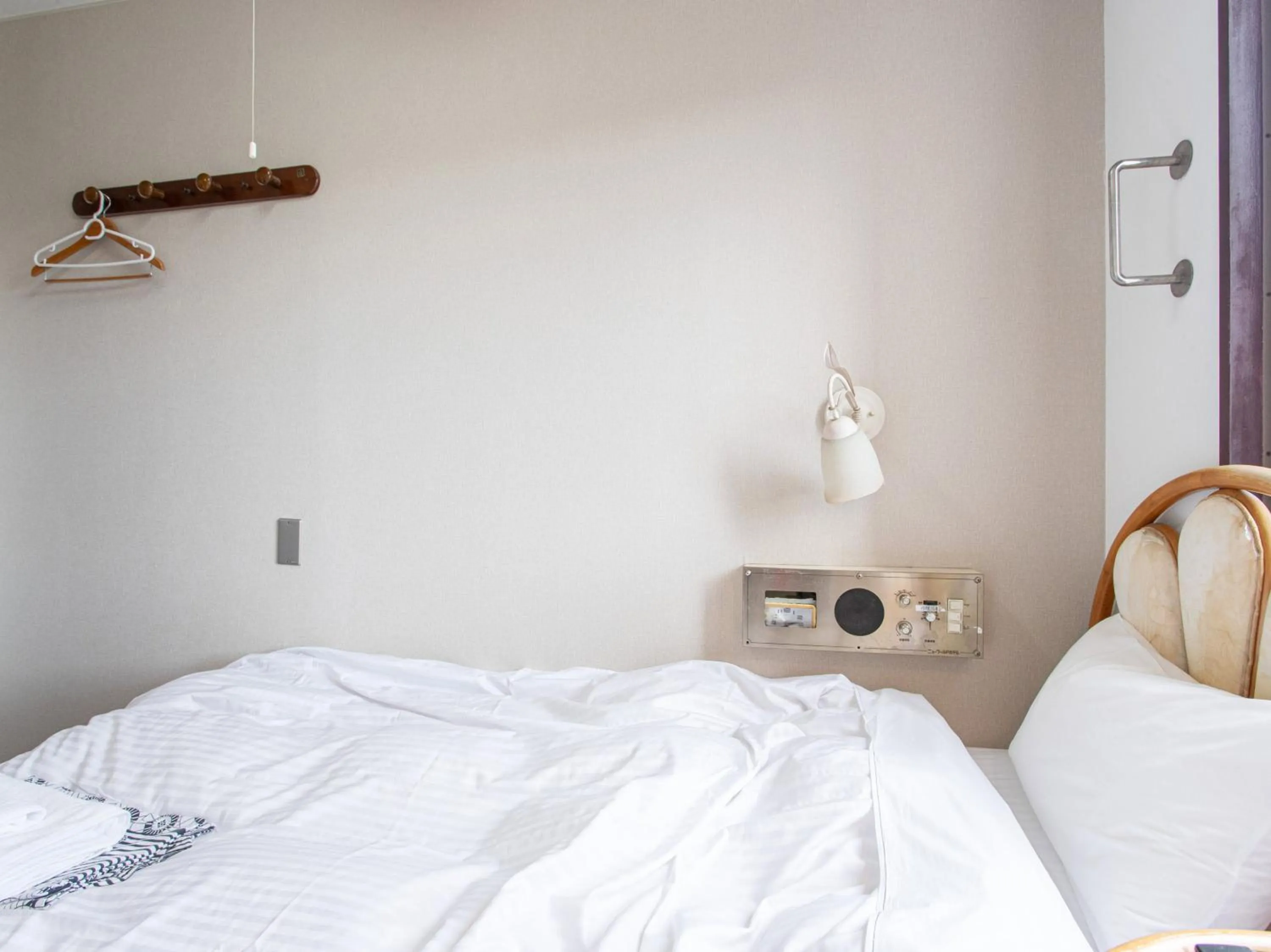 Photo of the whole room, Bed in Tabist New World Hotel Kagoshima Kanoya