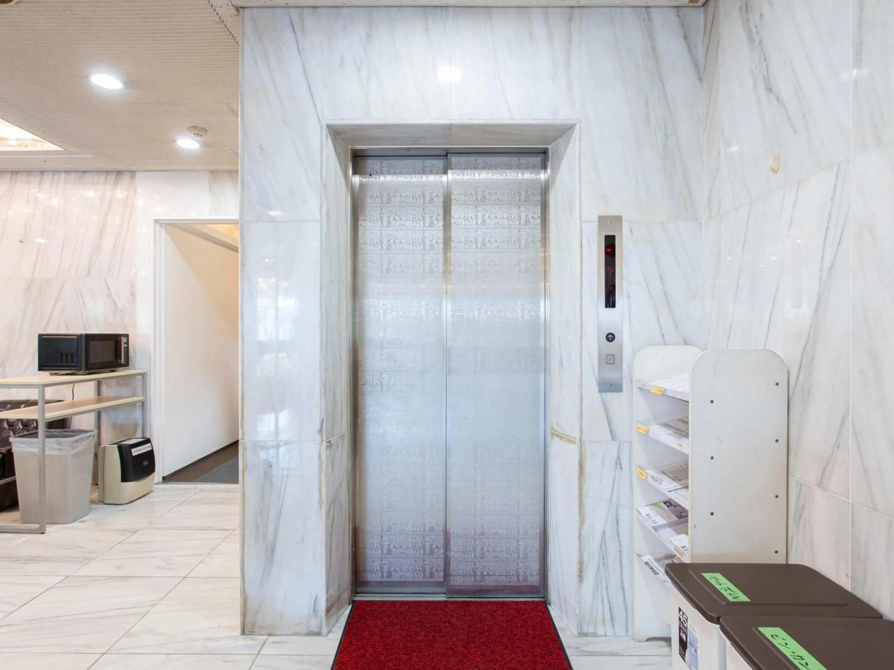 elevator in Tabist New World Hotel Kagoshima Kanoya