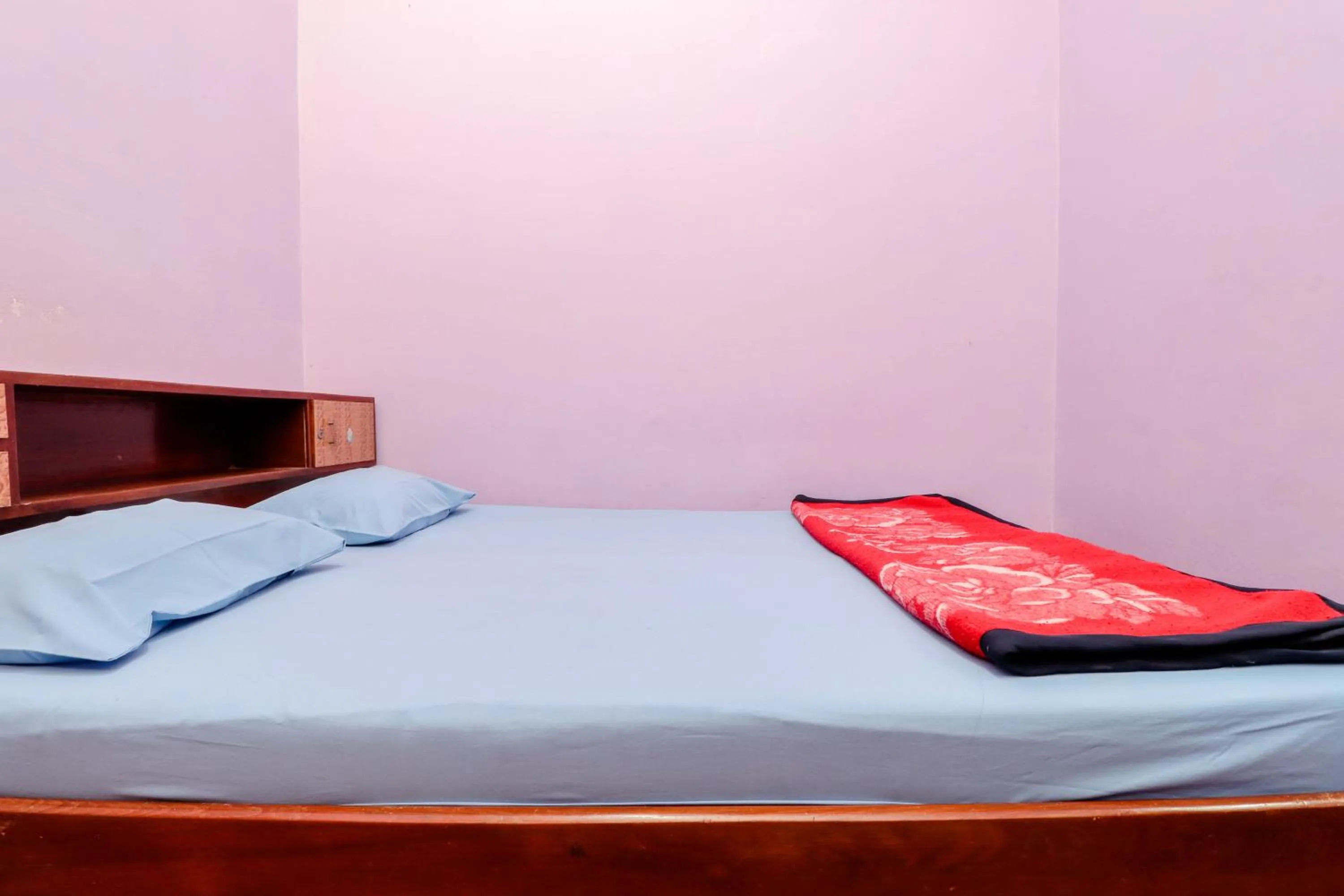 Bed in Penginapan Sedyo Rahayu