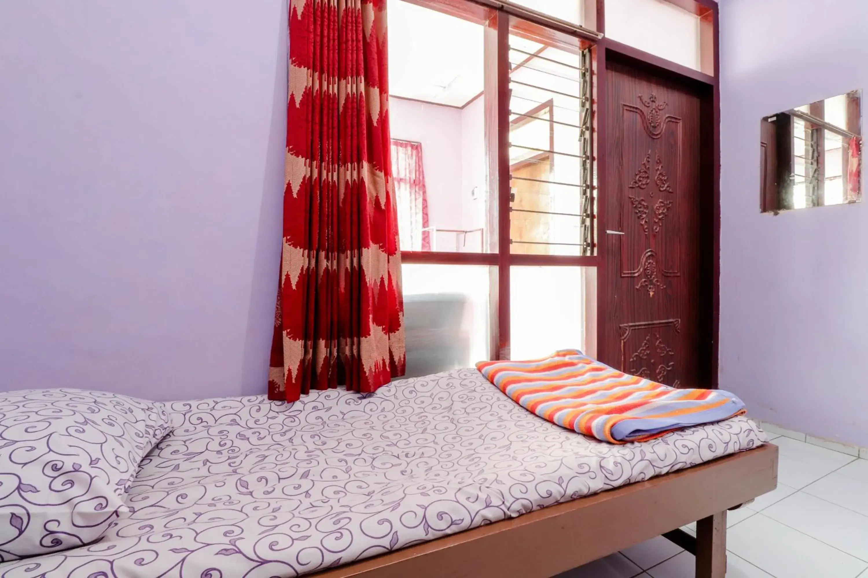 Bed in Penginapan Sedyo Rahayu Bed in Penginapan Sedyo Rahayu