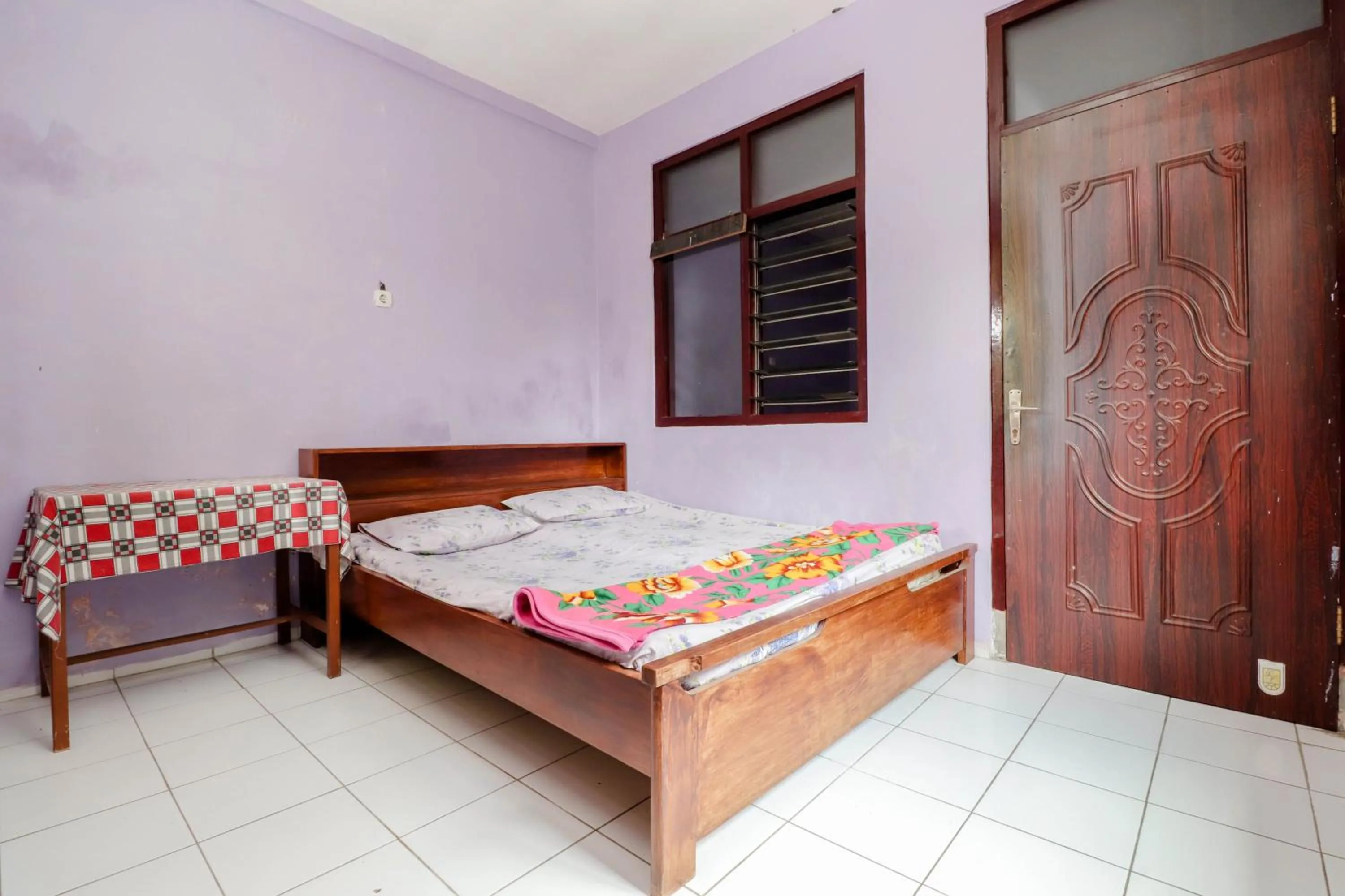 Bed in Penginapan Sedyo Rahayu