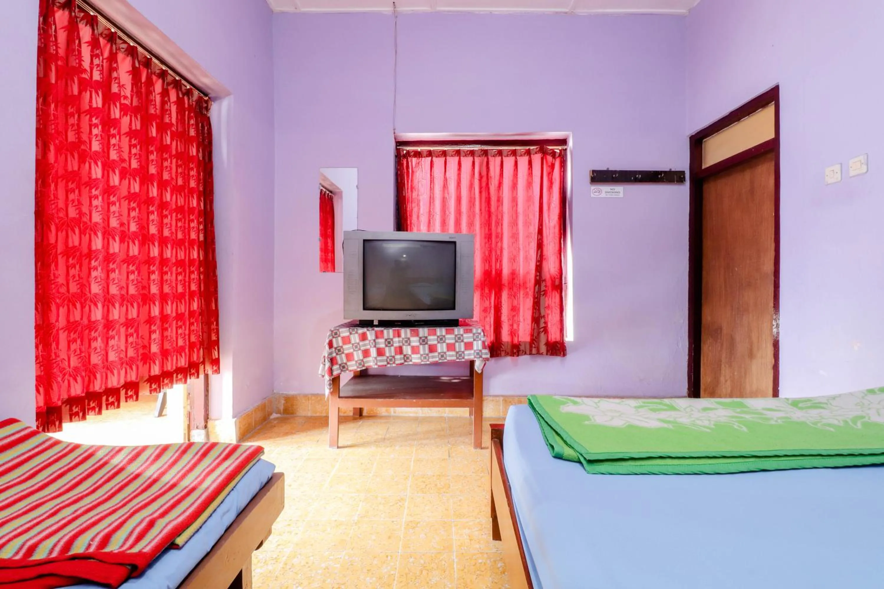 Bed in Penginapan Sedyo Rahayu