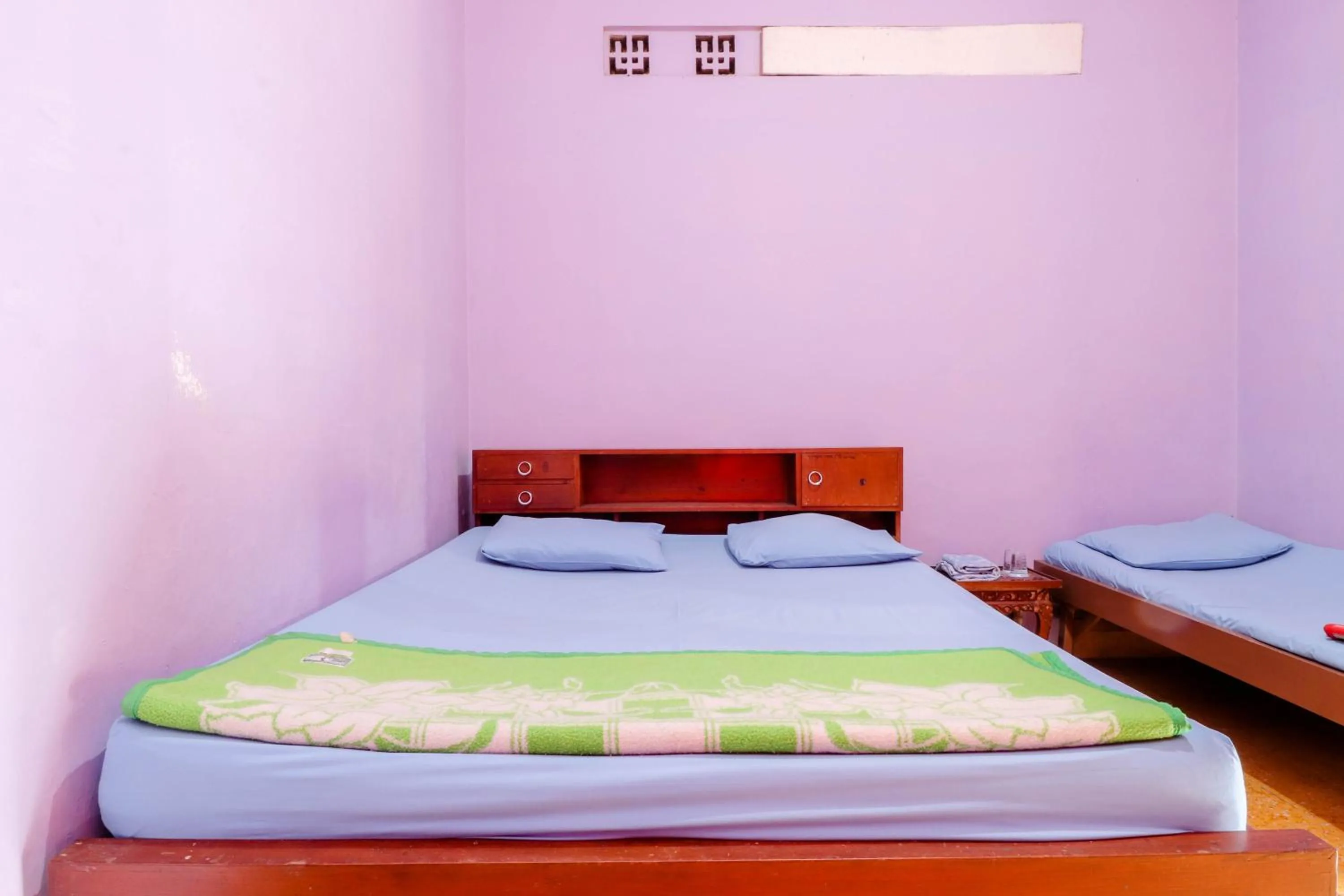 Bed in Penginapan Sedyo Rahayu