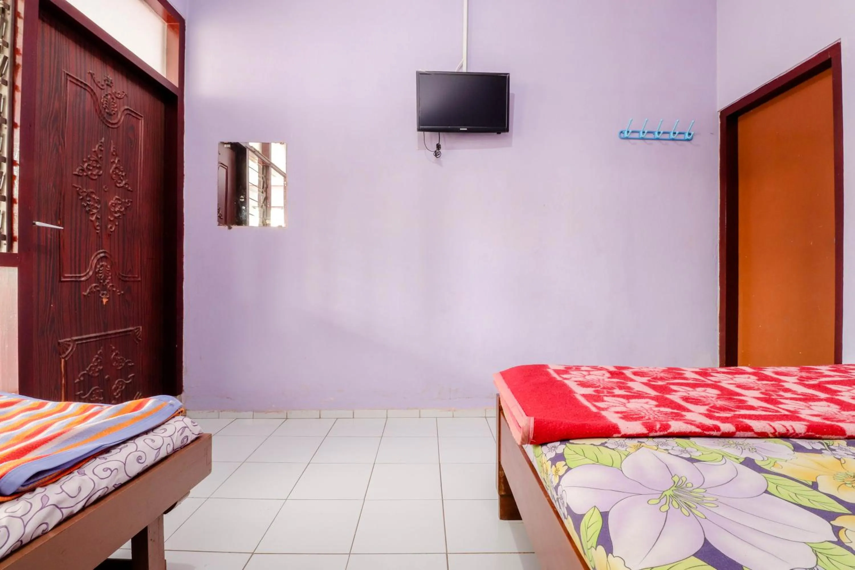 Bed in Penginapan Sedyo Rahayu