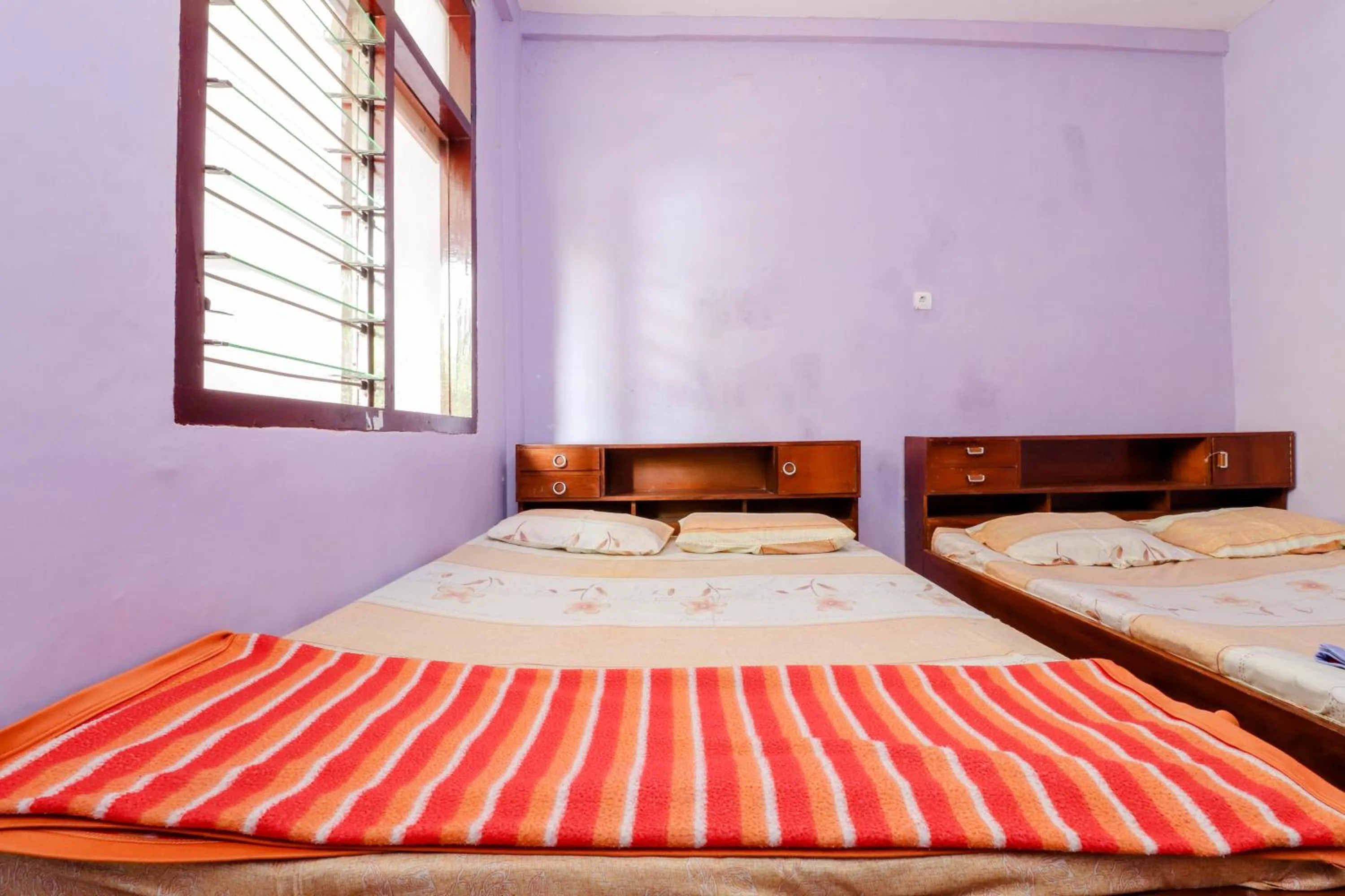 Bed in Penginapan Sedyo Rahayu