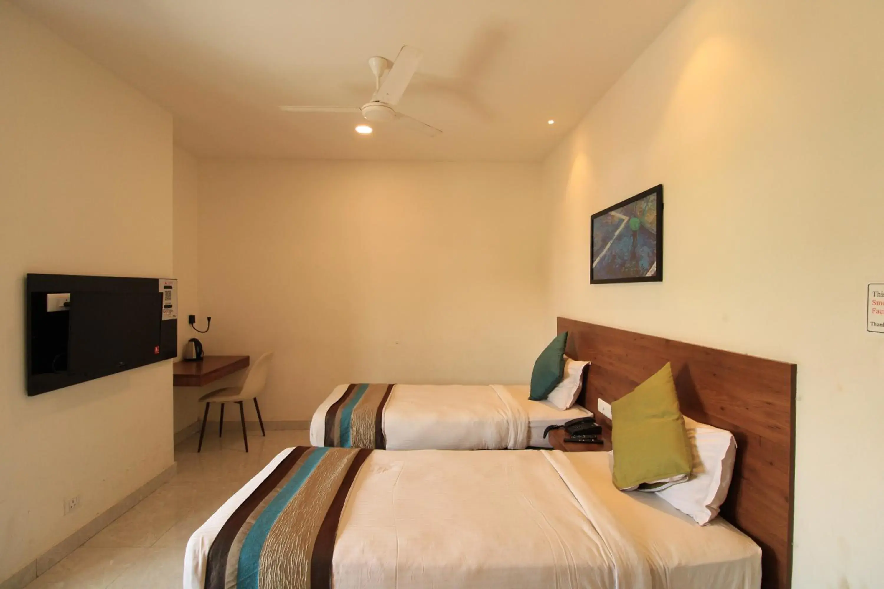 Bedroom in Arunaa Inn Airport Hotel,Chennai Bedroom in Arunaa Inn Airport Hotel,Chennai