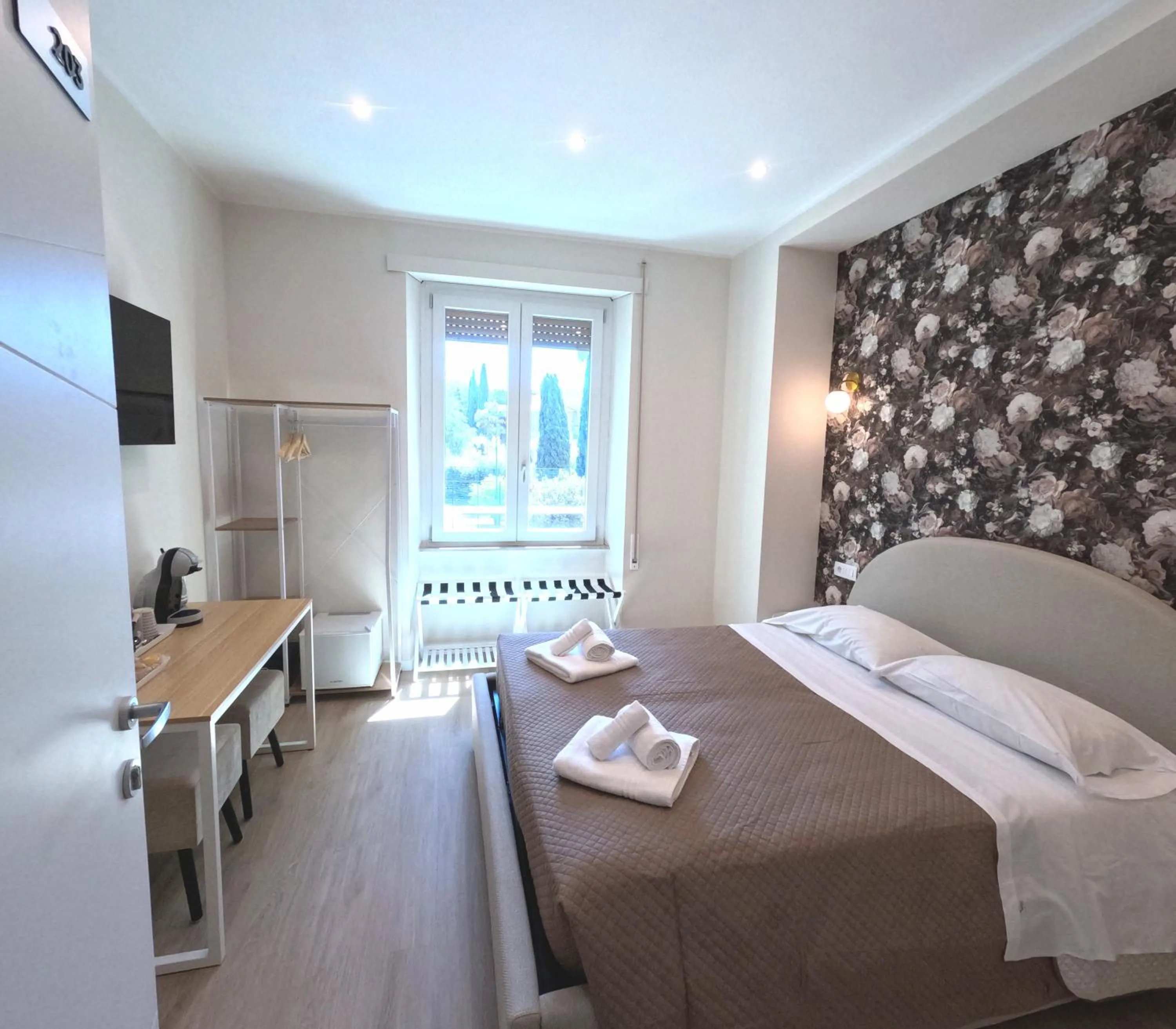 Bed in B&B Aurelia Garden Rooms