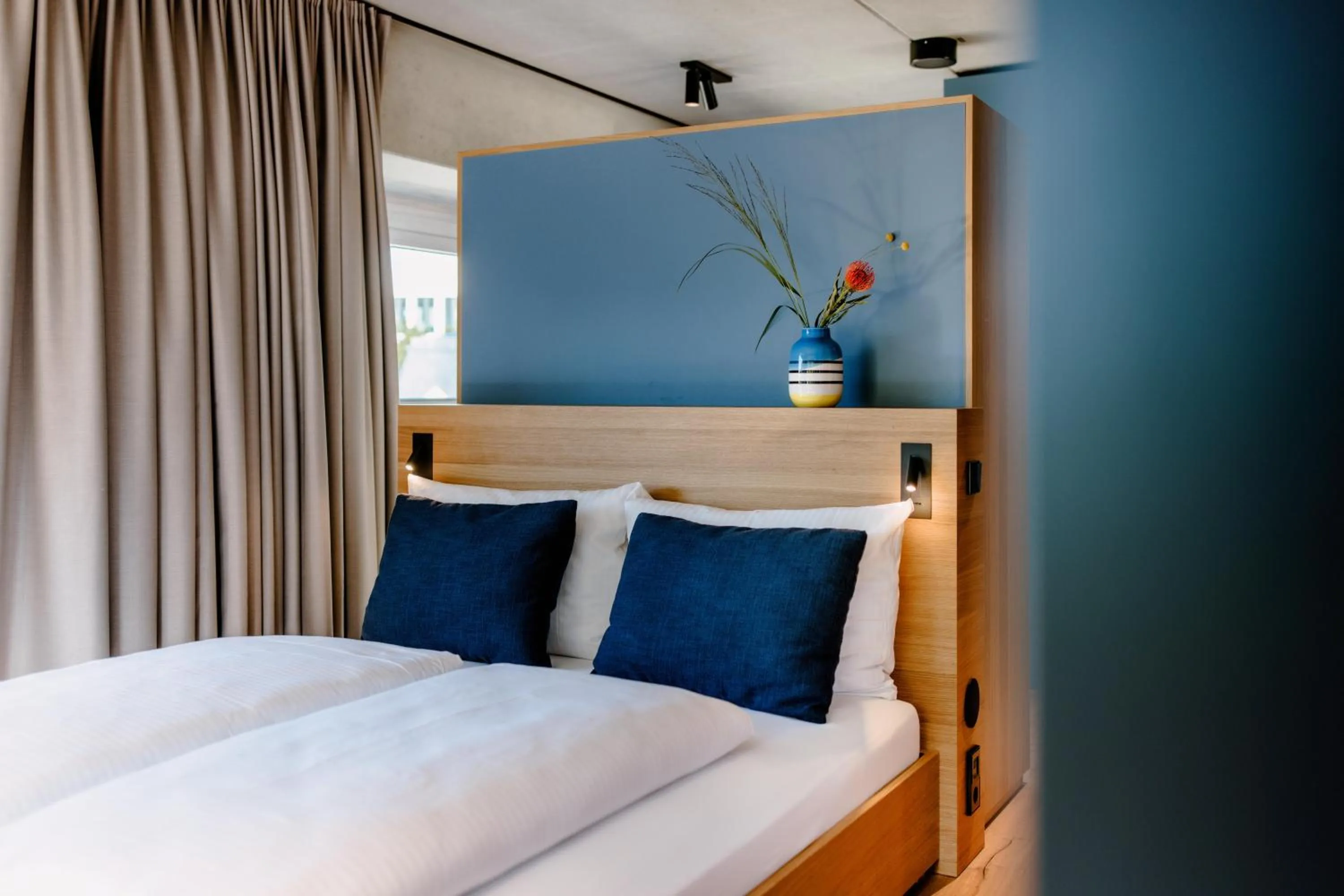 Photo of the whole room, Bed in THE FLAG West M.