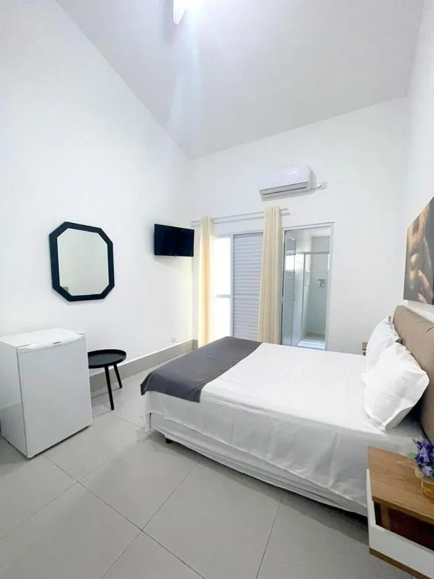 Bed in Pousada Village Cozumel