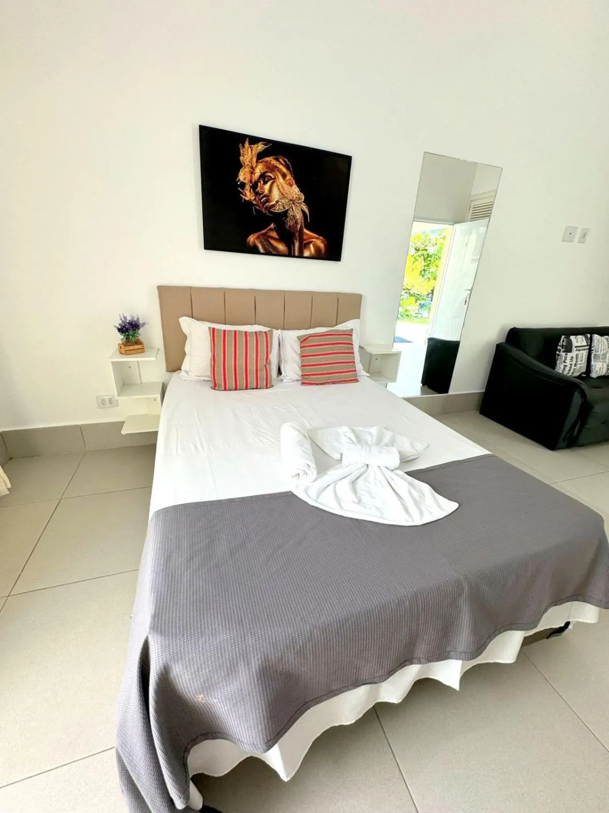 Bed in Pousada Village Cozumel