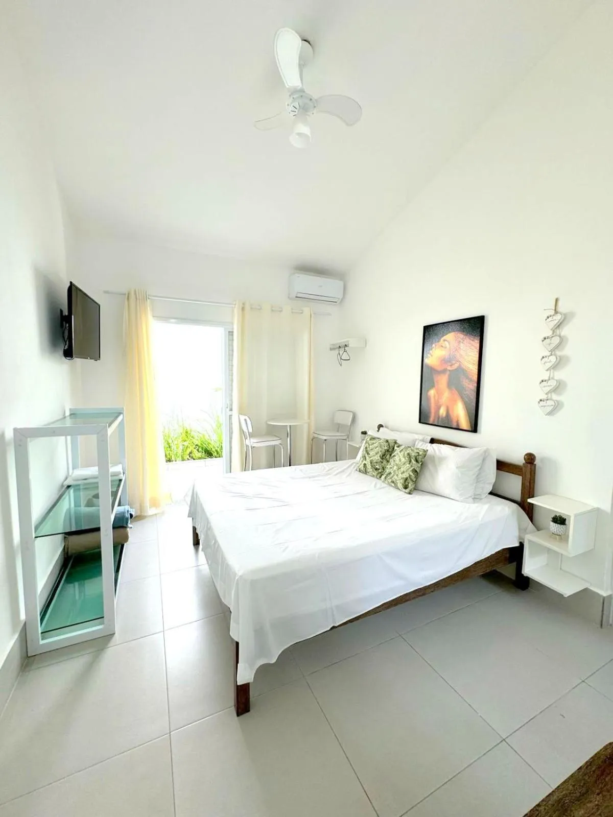 Bed in Pousada Village Cozumel