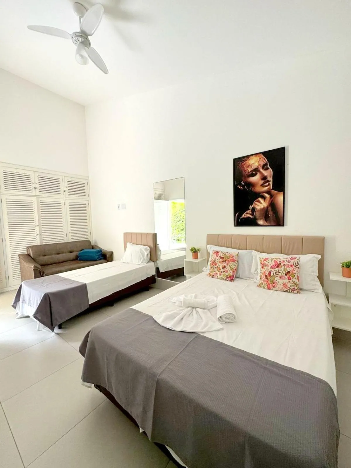 Bed in Pousada Village Cozumel