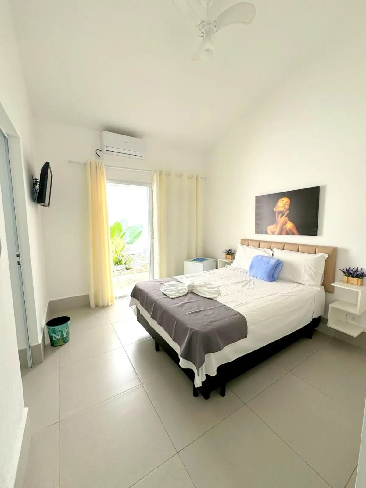 Bed in Pousada Village Cozumel