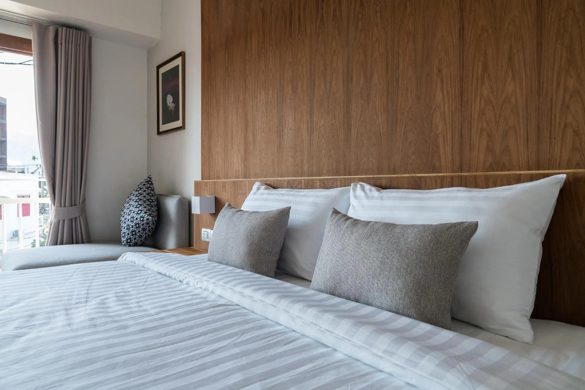 Bed in Nuan Boutique Hotel