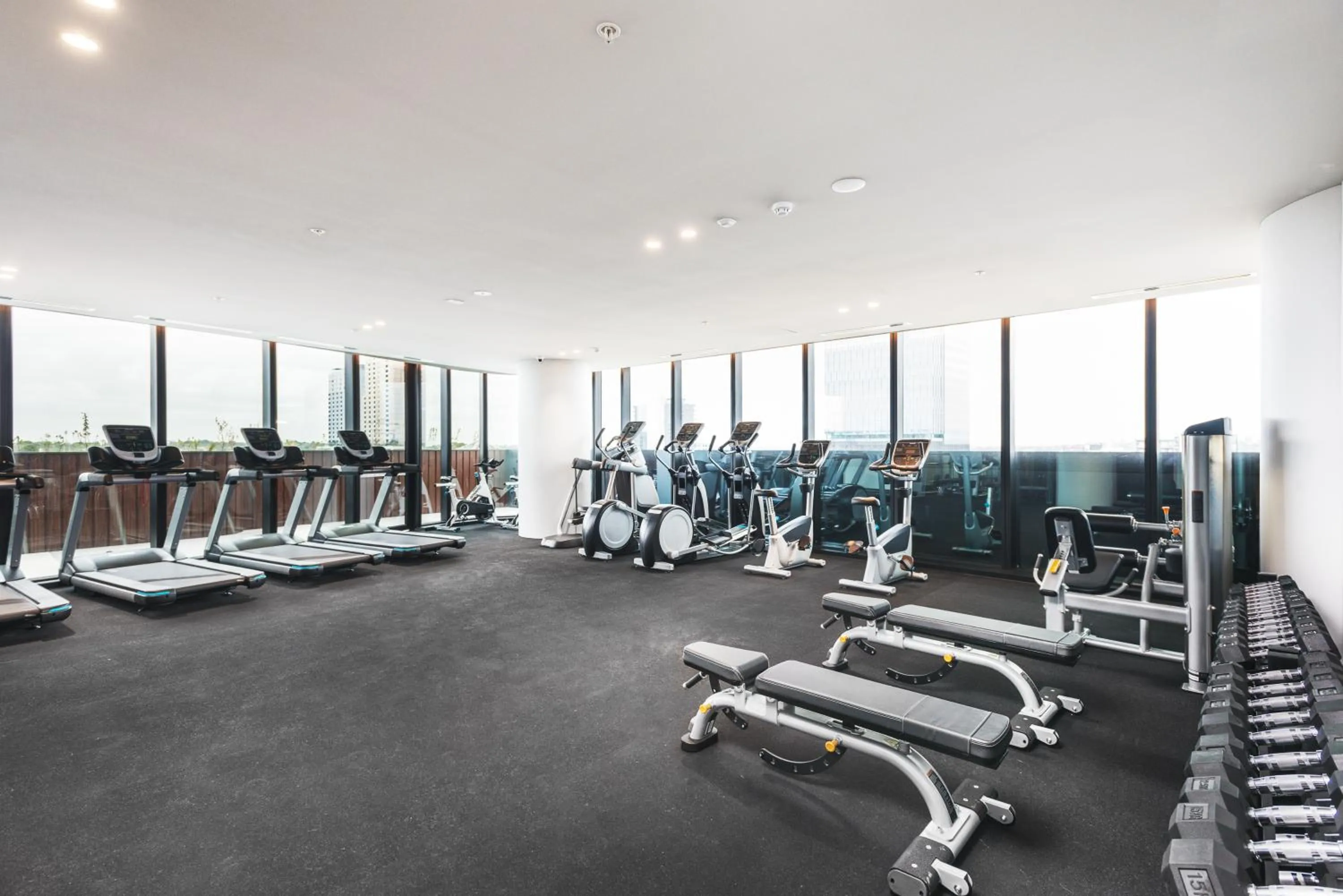 Fitness centre/facilities in Sky One Apartments by CLLIX