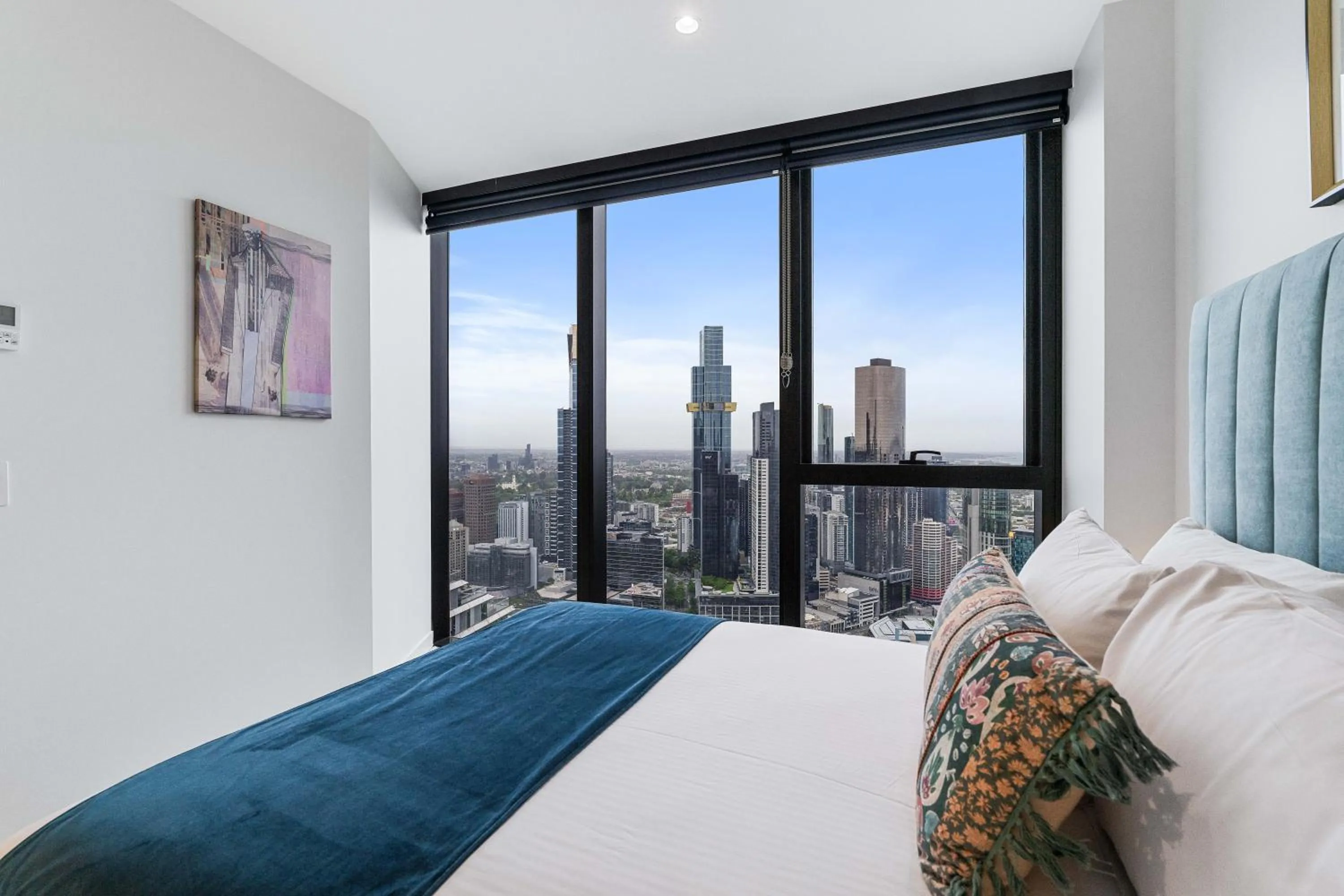 Bed in Collins House Apartments by CLLIX