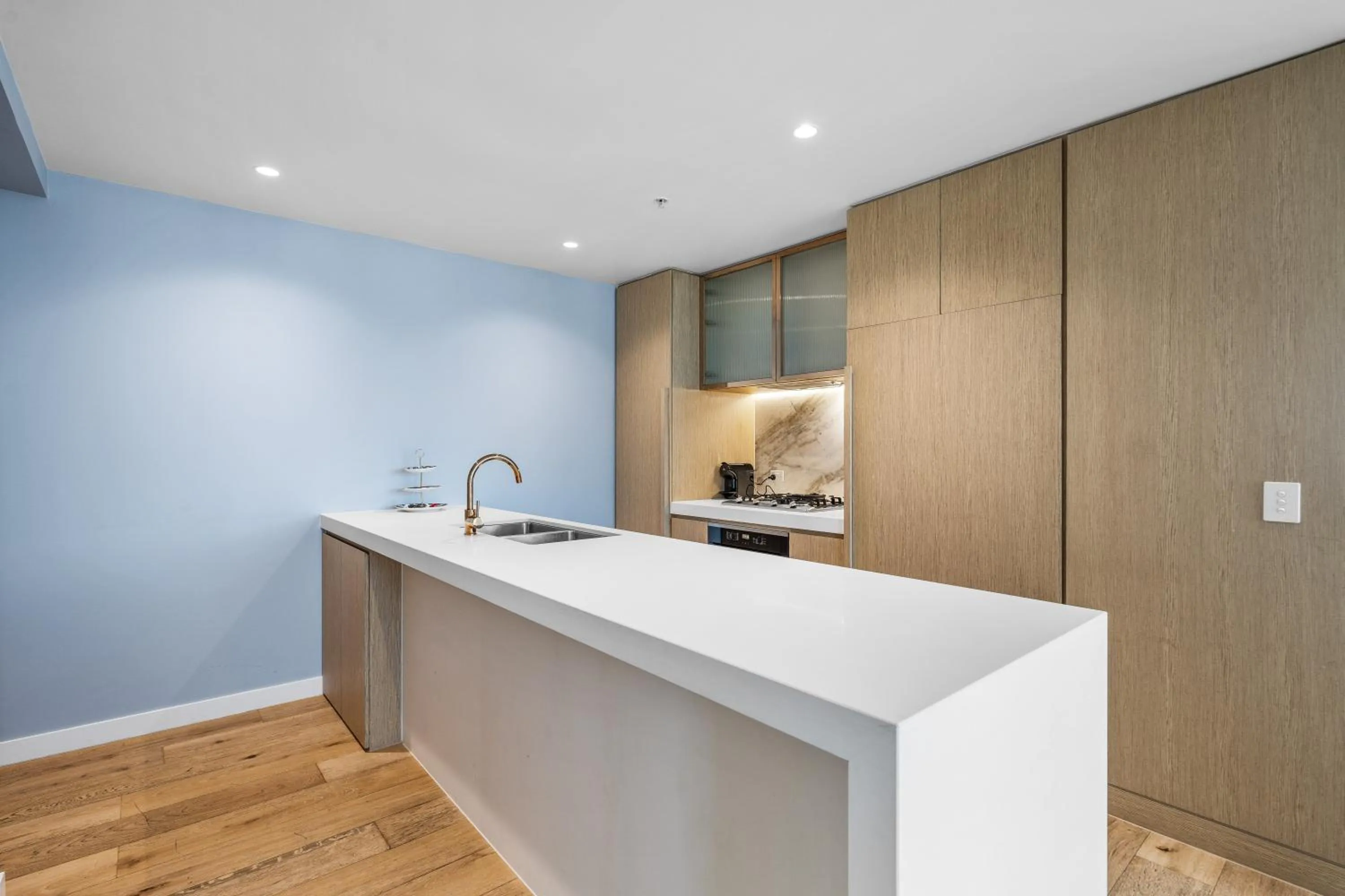 kitchen in Collins House Apartments by CLLIX