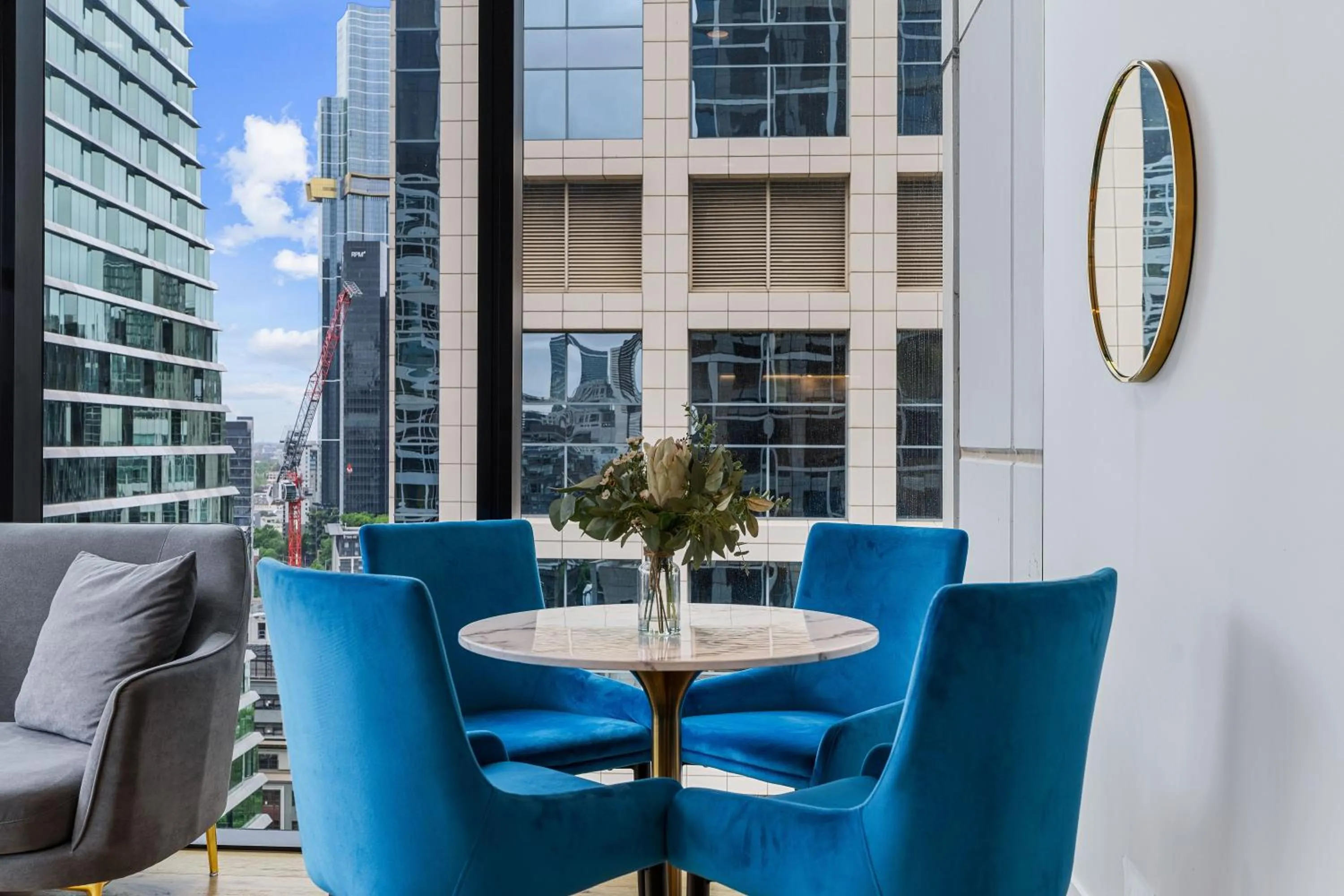 Dining area in Collins House Apartments by CLLIX
