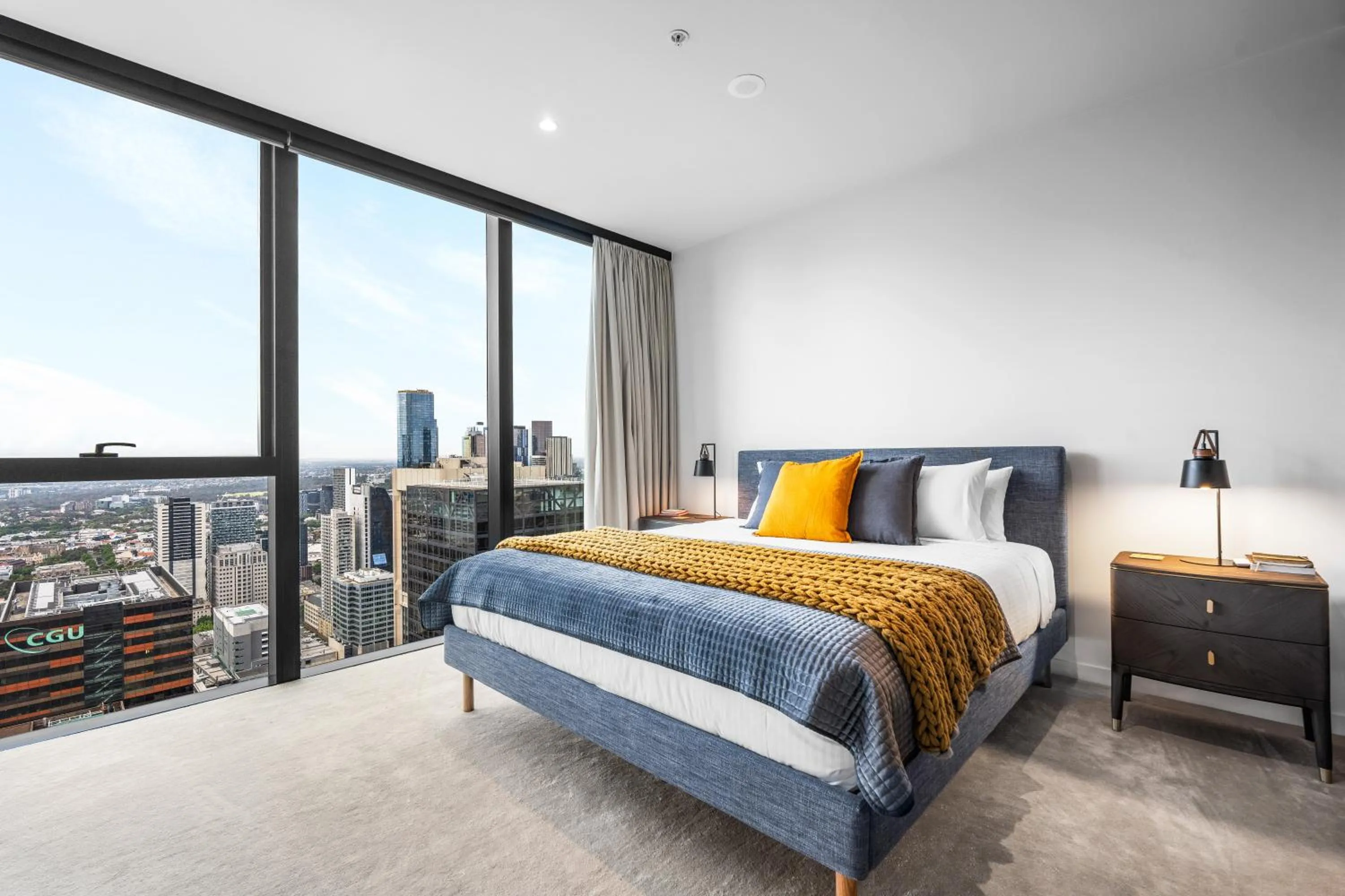 Bed in Collins House Apartments by CLLIX