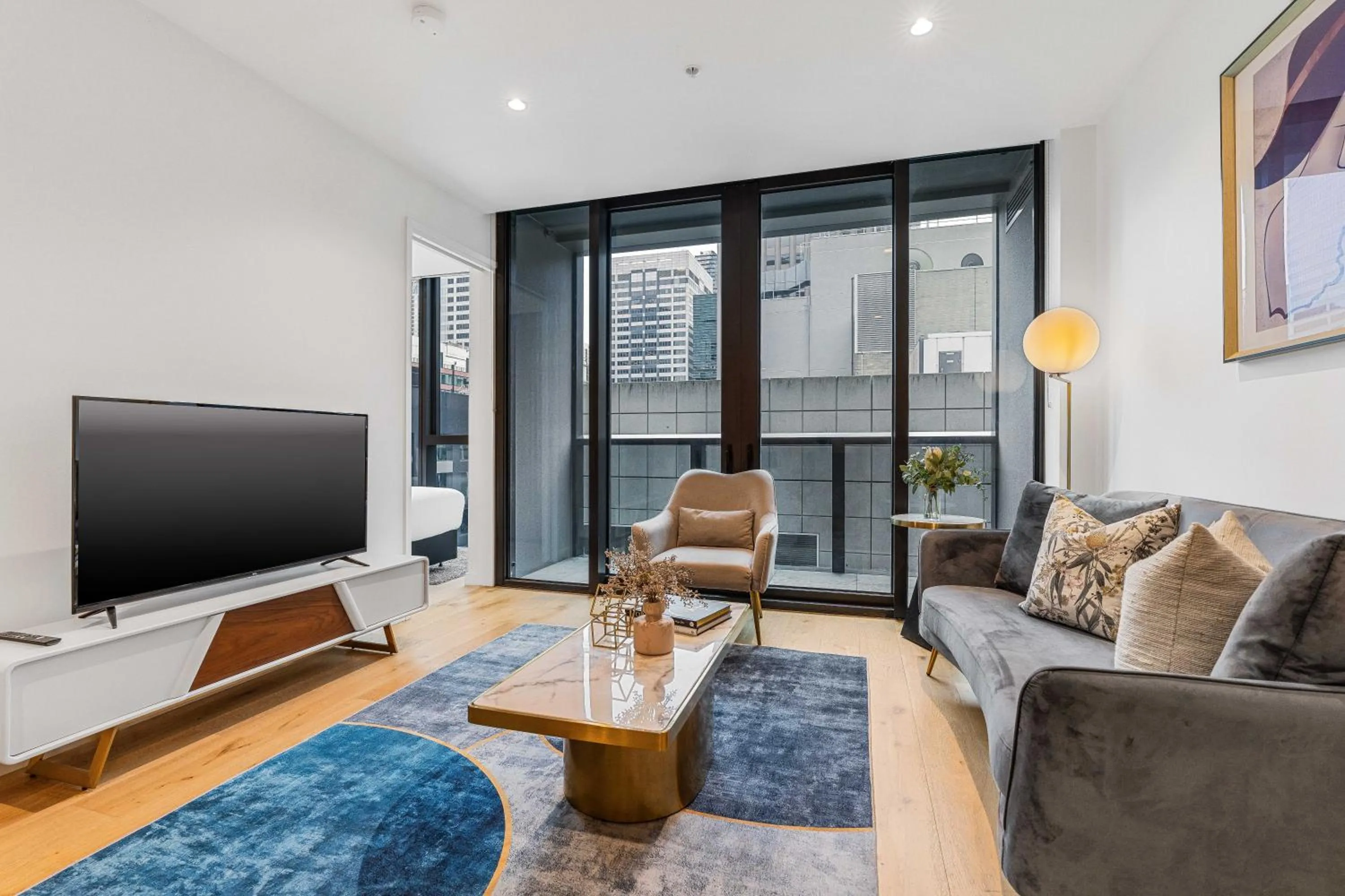 TV and multimedia in Collins House Apartments by CLLIX