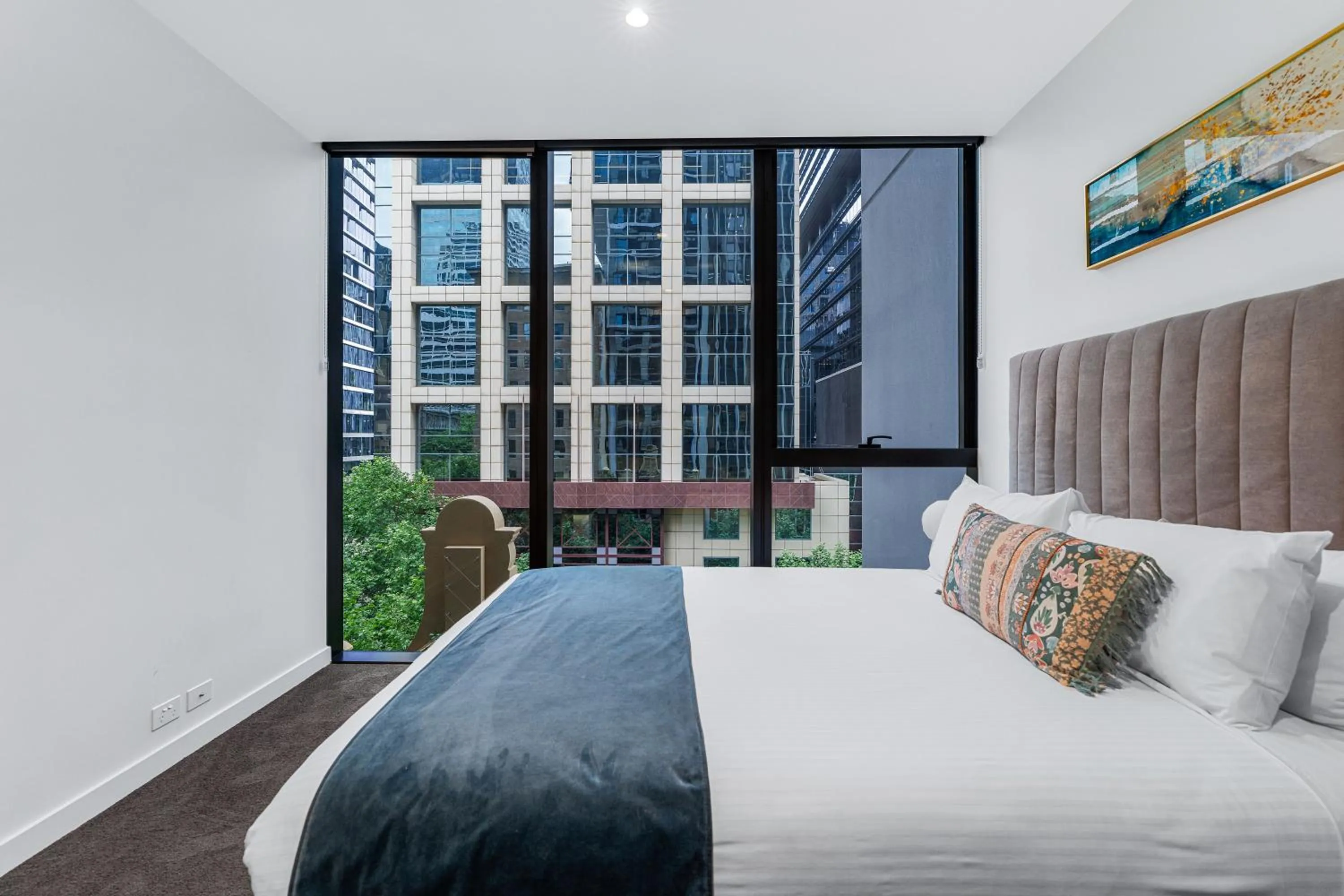 Bed in Collins House Apartments by CLLIX