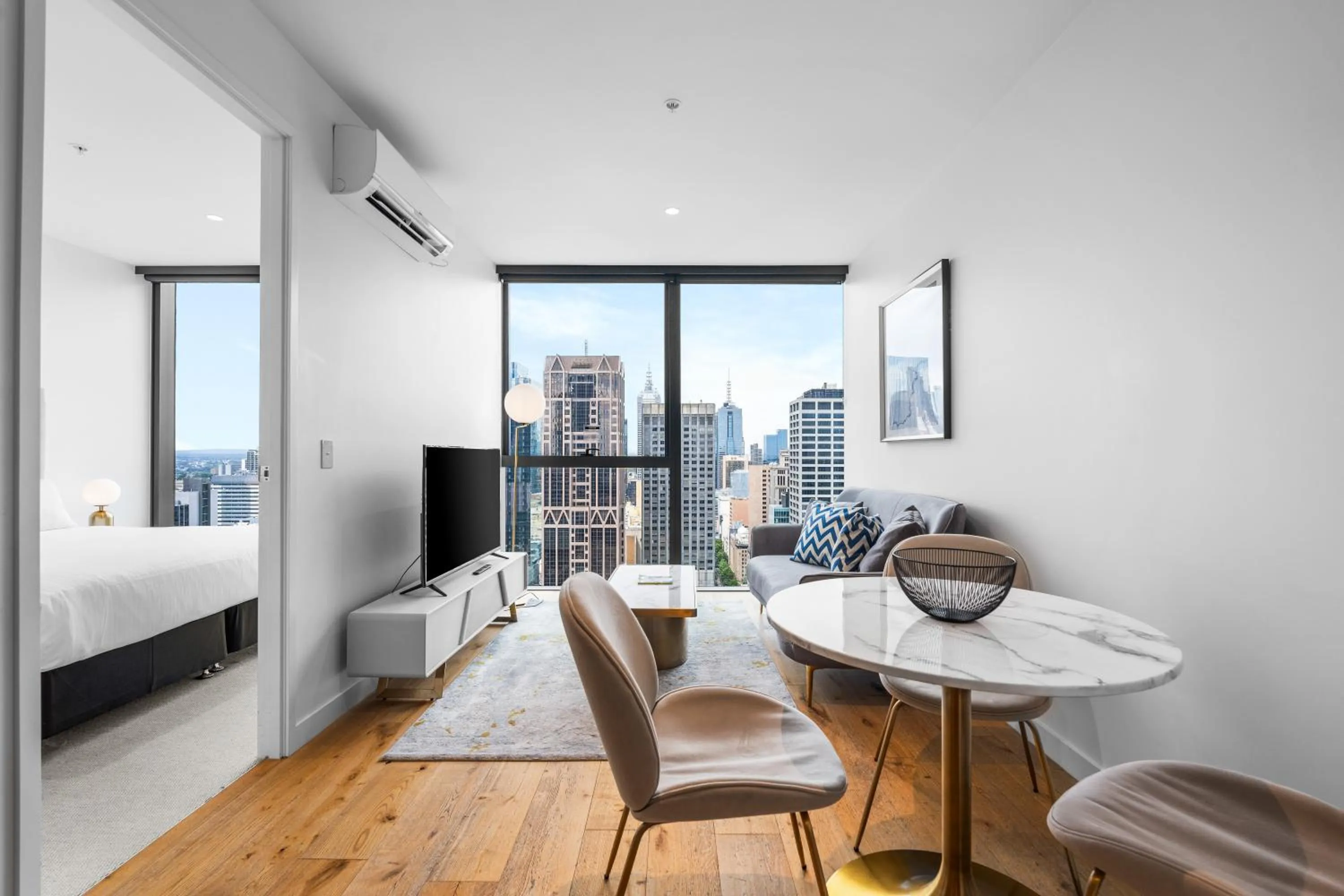 Living room in Collins House Apartments by CLLIX