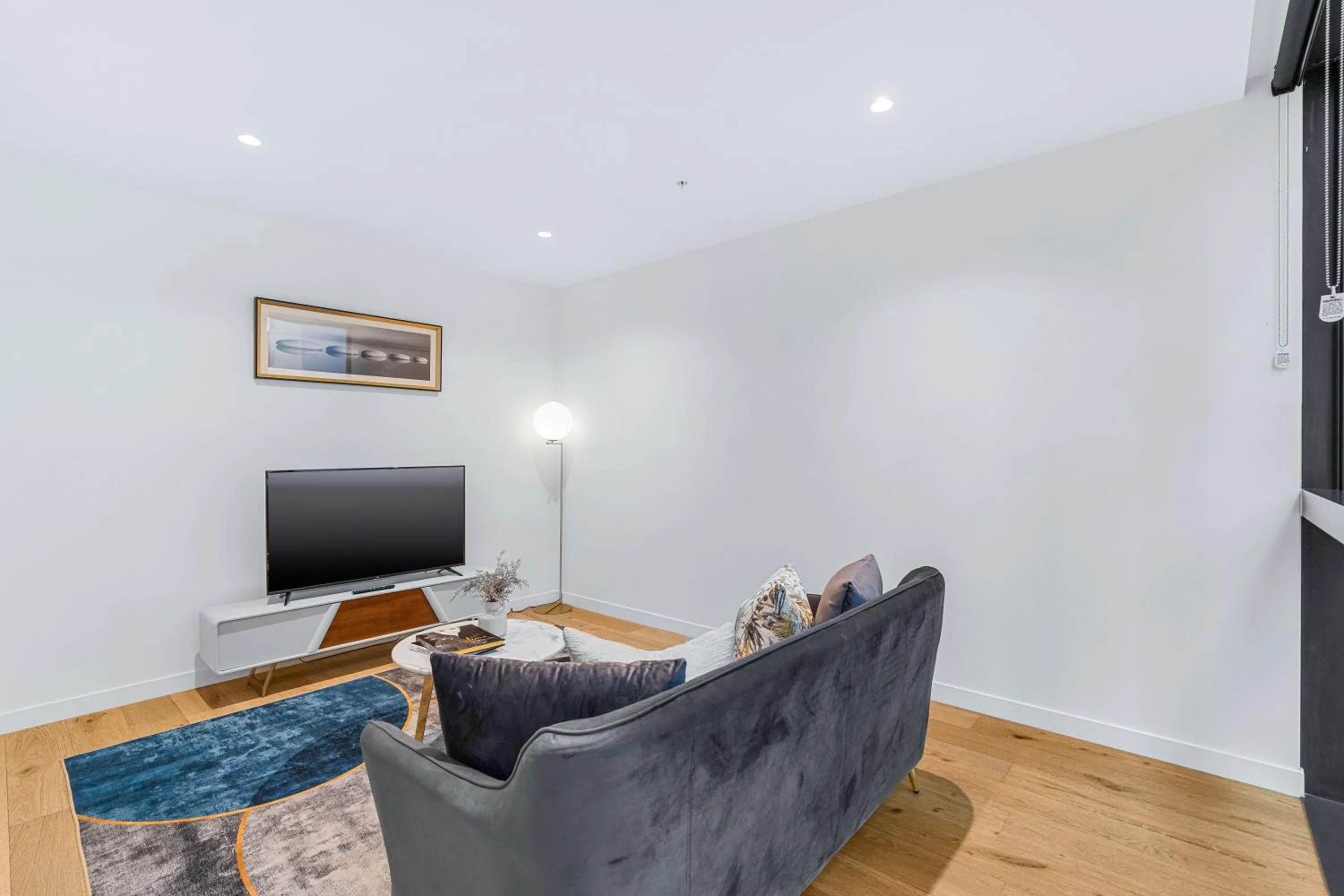 TV and multimedia in Collins House Apartments by CLLIX