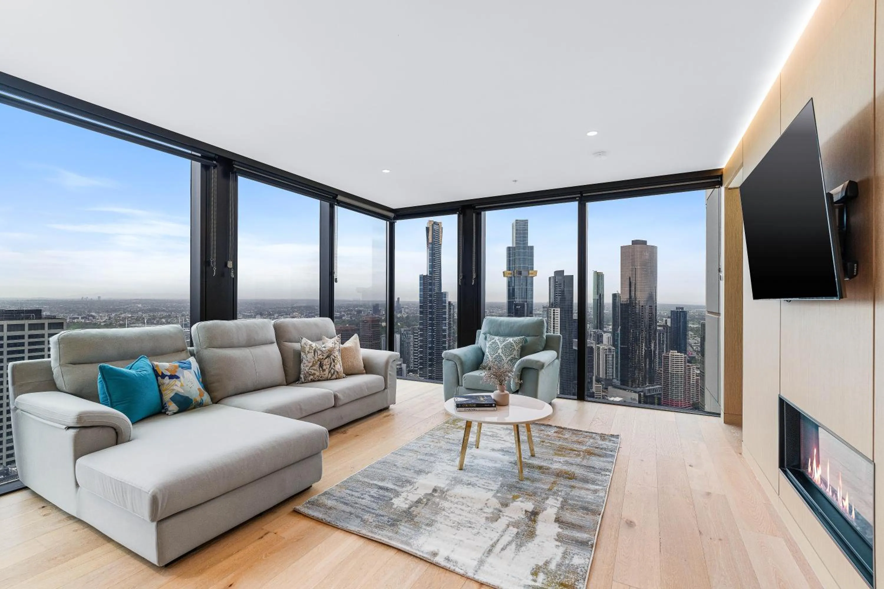 Living room in Collins House Apartments by CLLIX