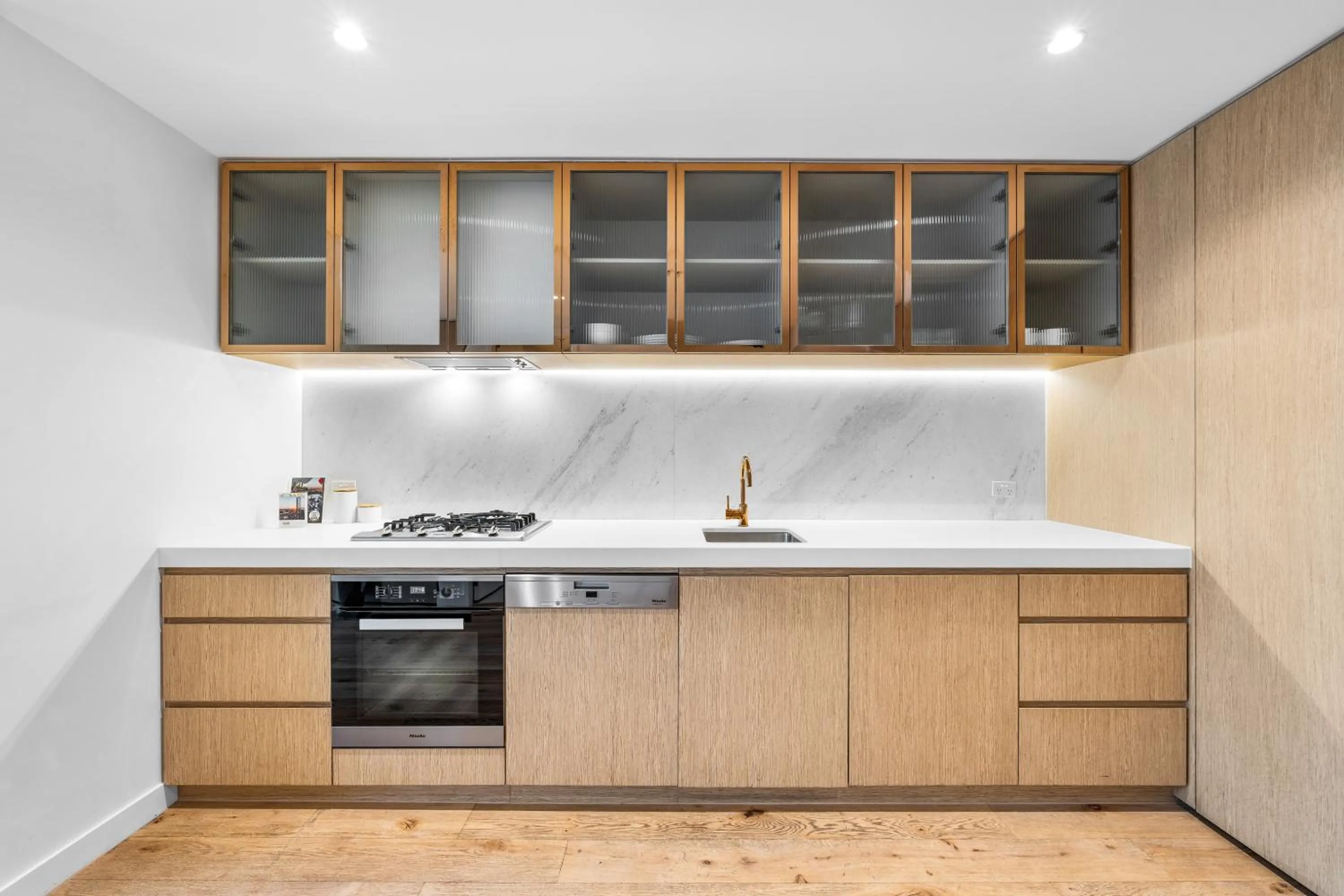 kitchen in Collins House Apartments by CLLIX