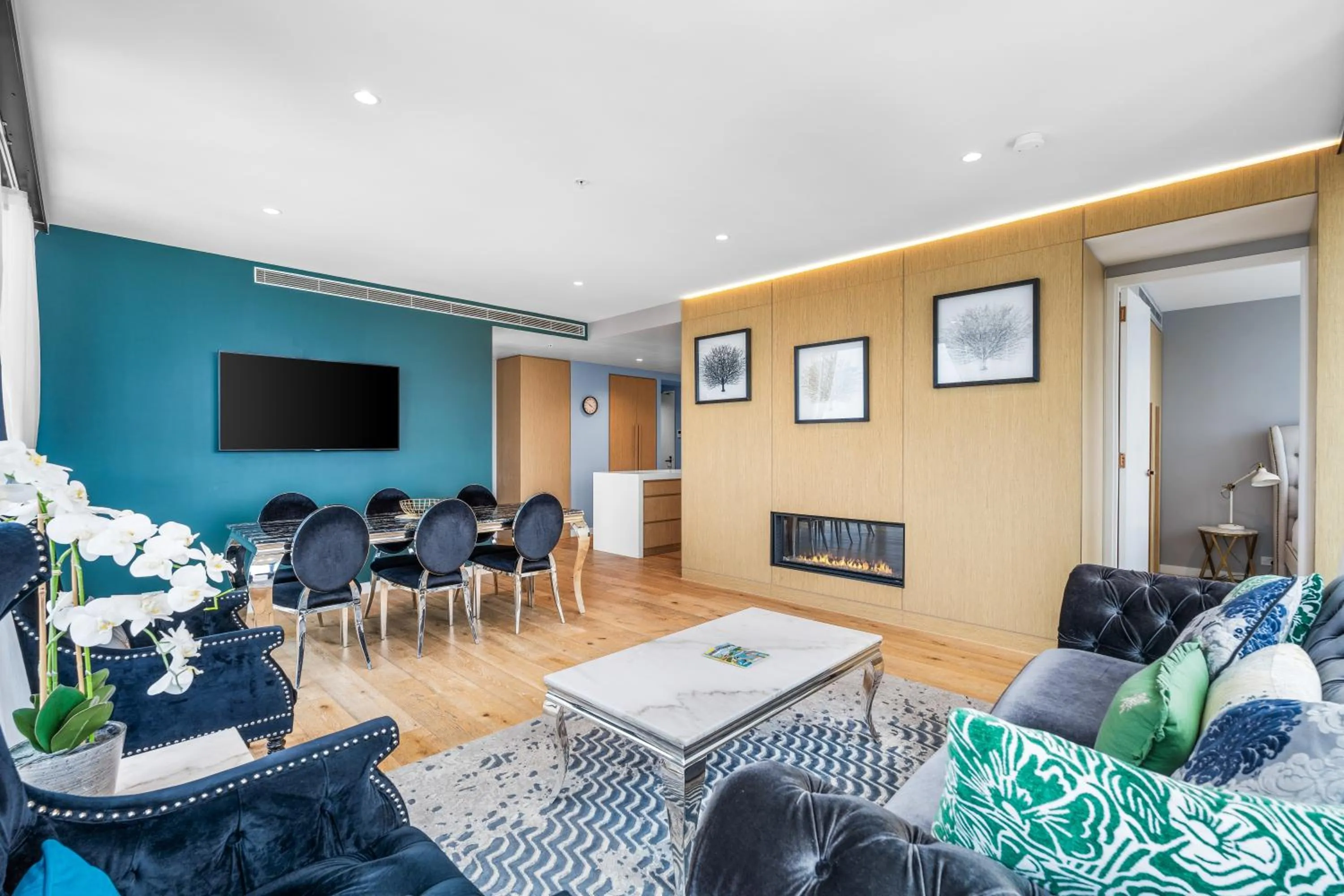 Living room in Collins House Apartments by CLLIX