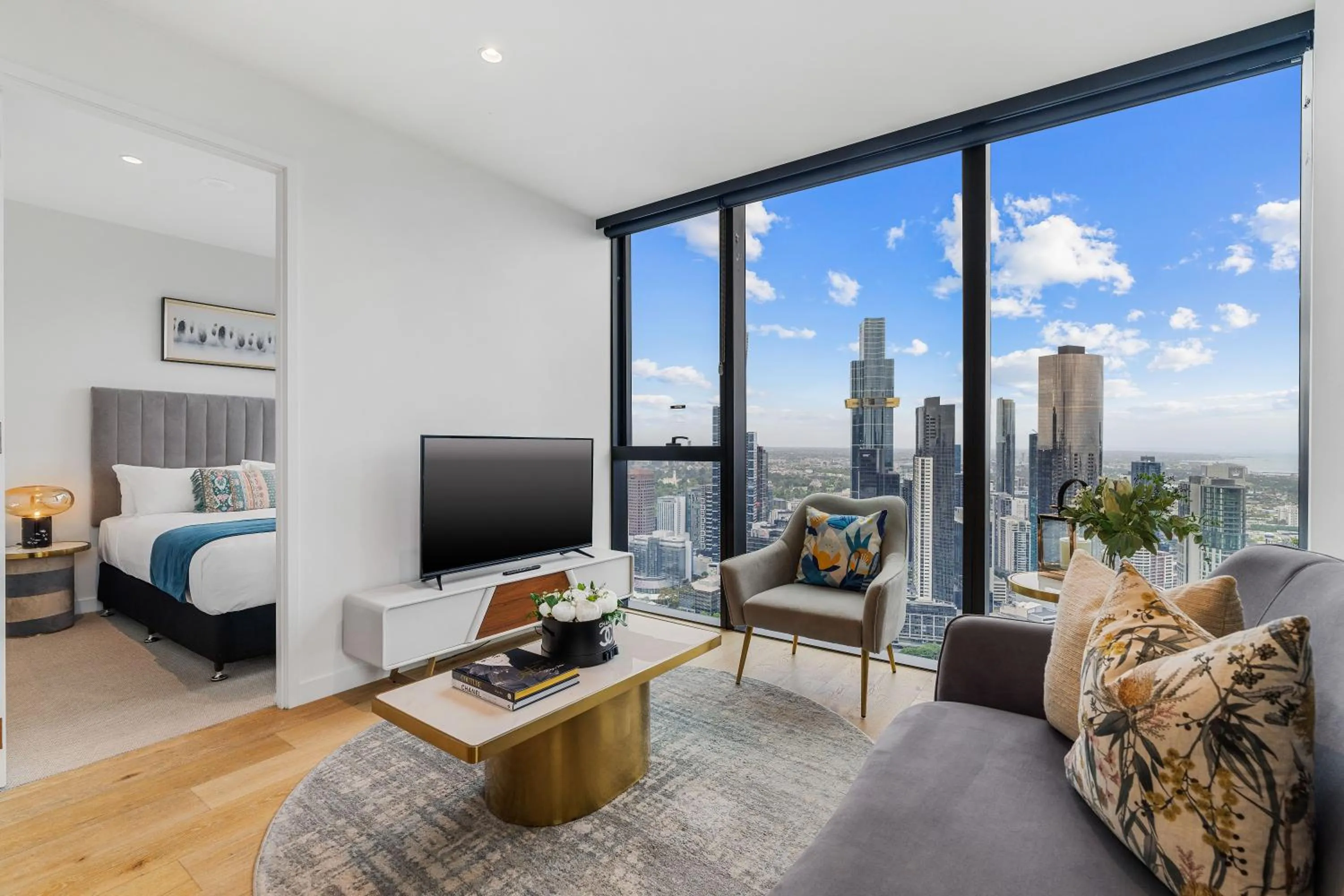 Living room, Bed in Collins House Apartments by CLLIX