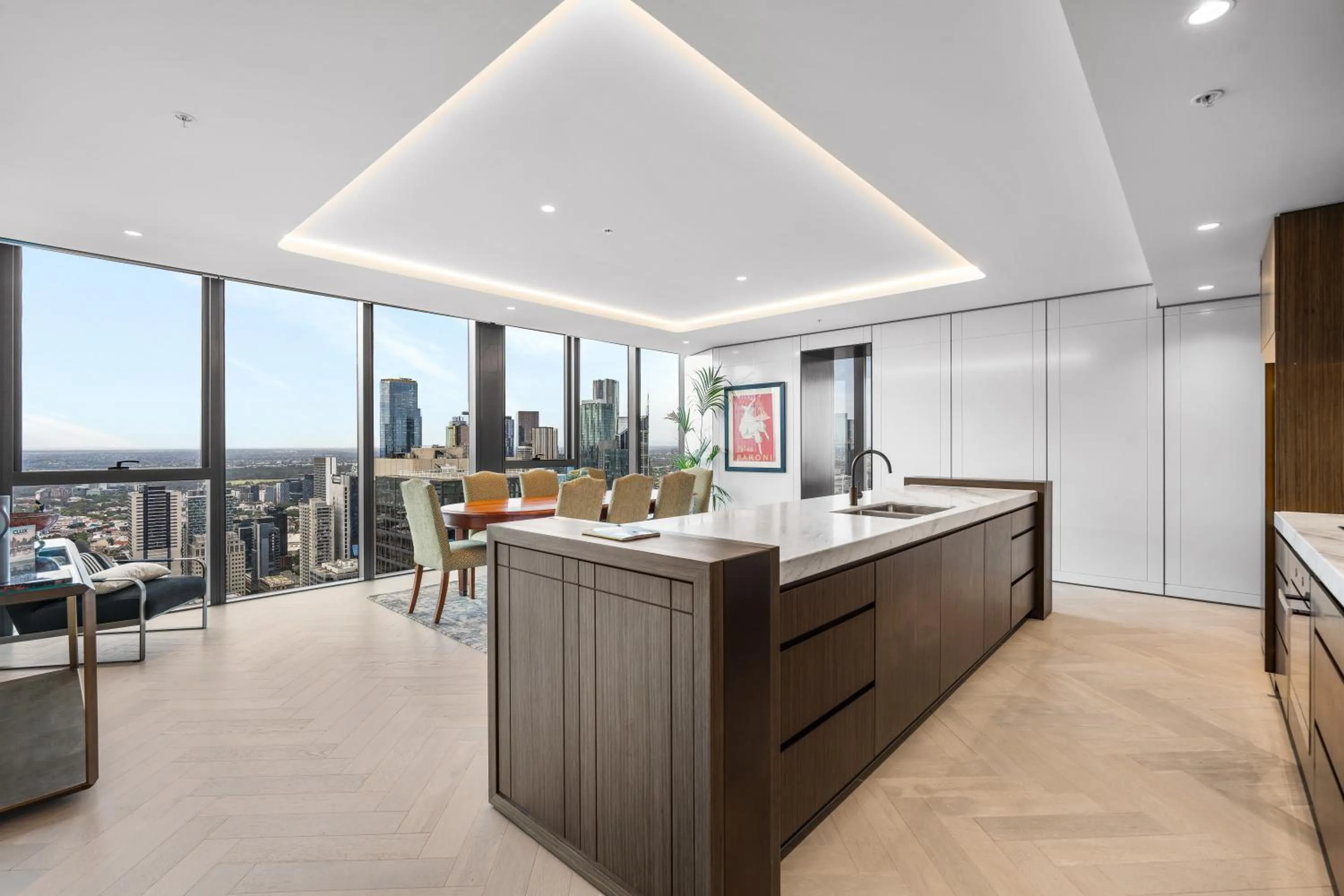 Dining area in Collins House Apartments by CLLIX
