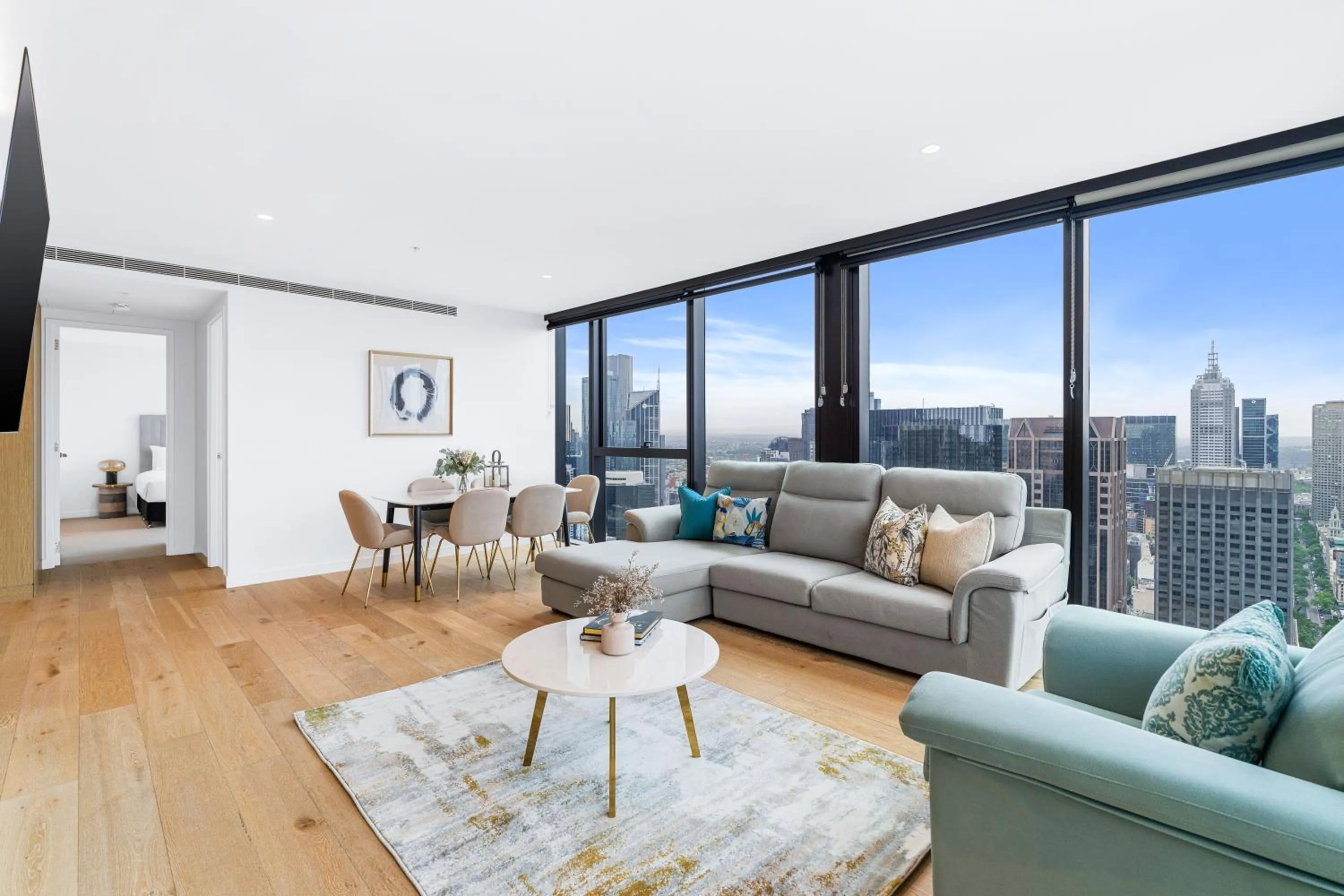 Living room in Collins House Apartments by CLLIX
