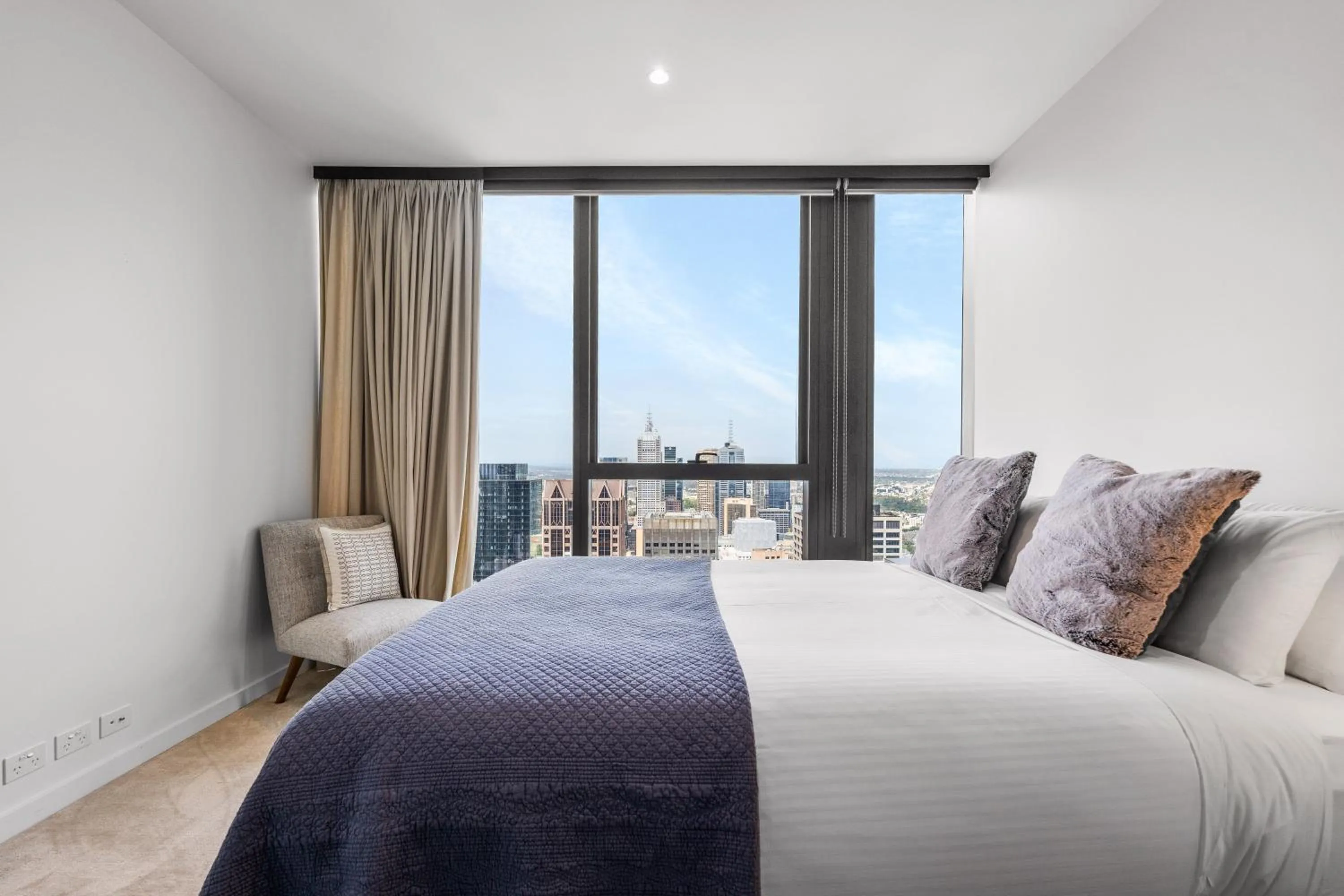 Bed in Collins House Apartments by CLLIX