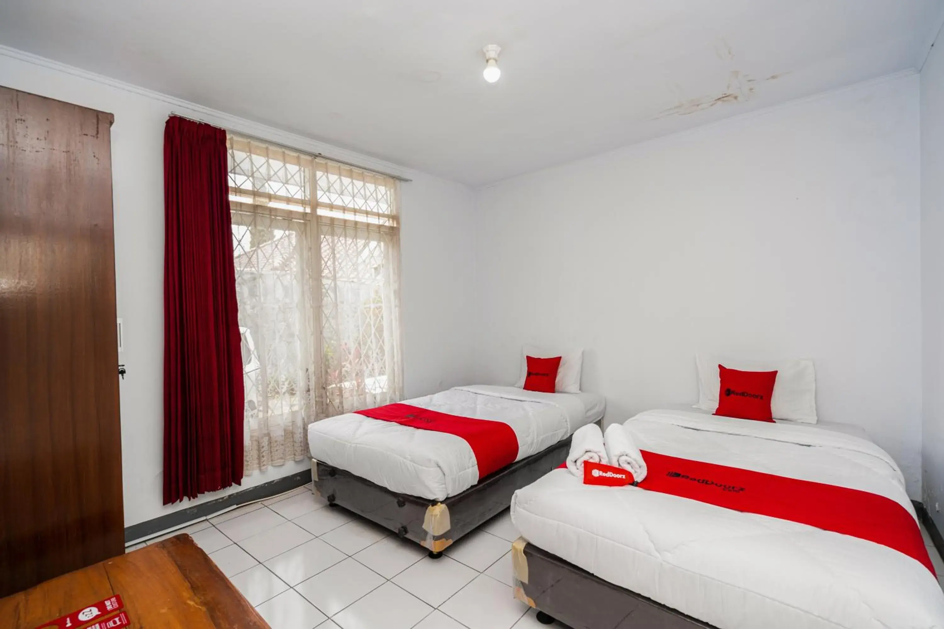 Bed in RedDoorz Syariah near RSUD Cimacan Bed in RedDoorz Syariah near RSUD Cimacan