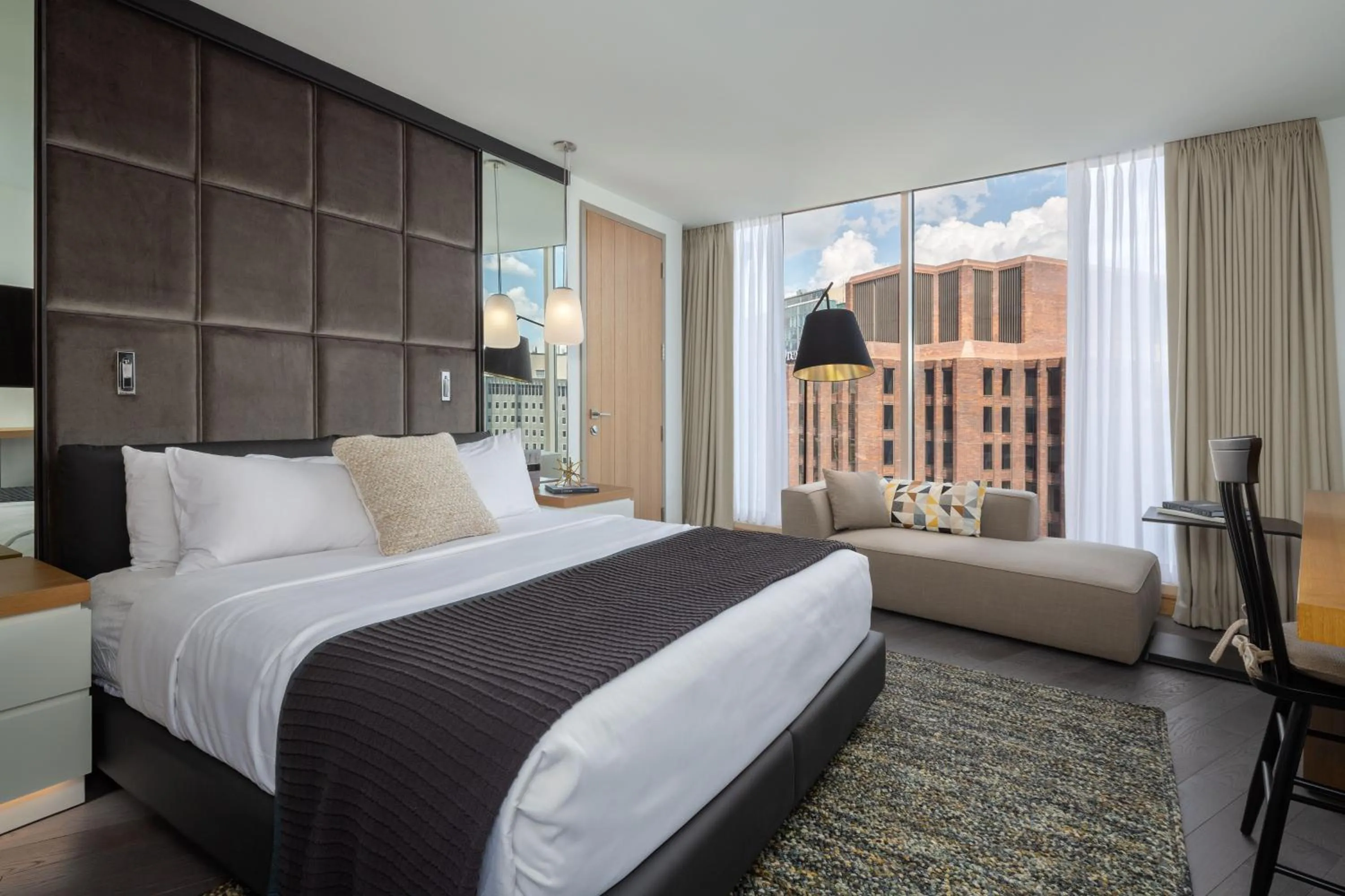 Bed in The Windsor Suites