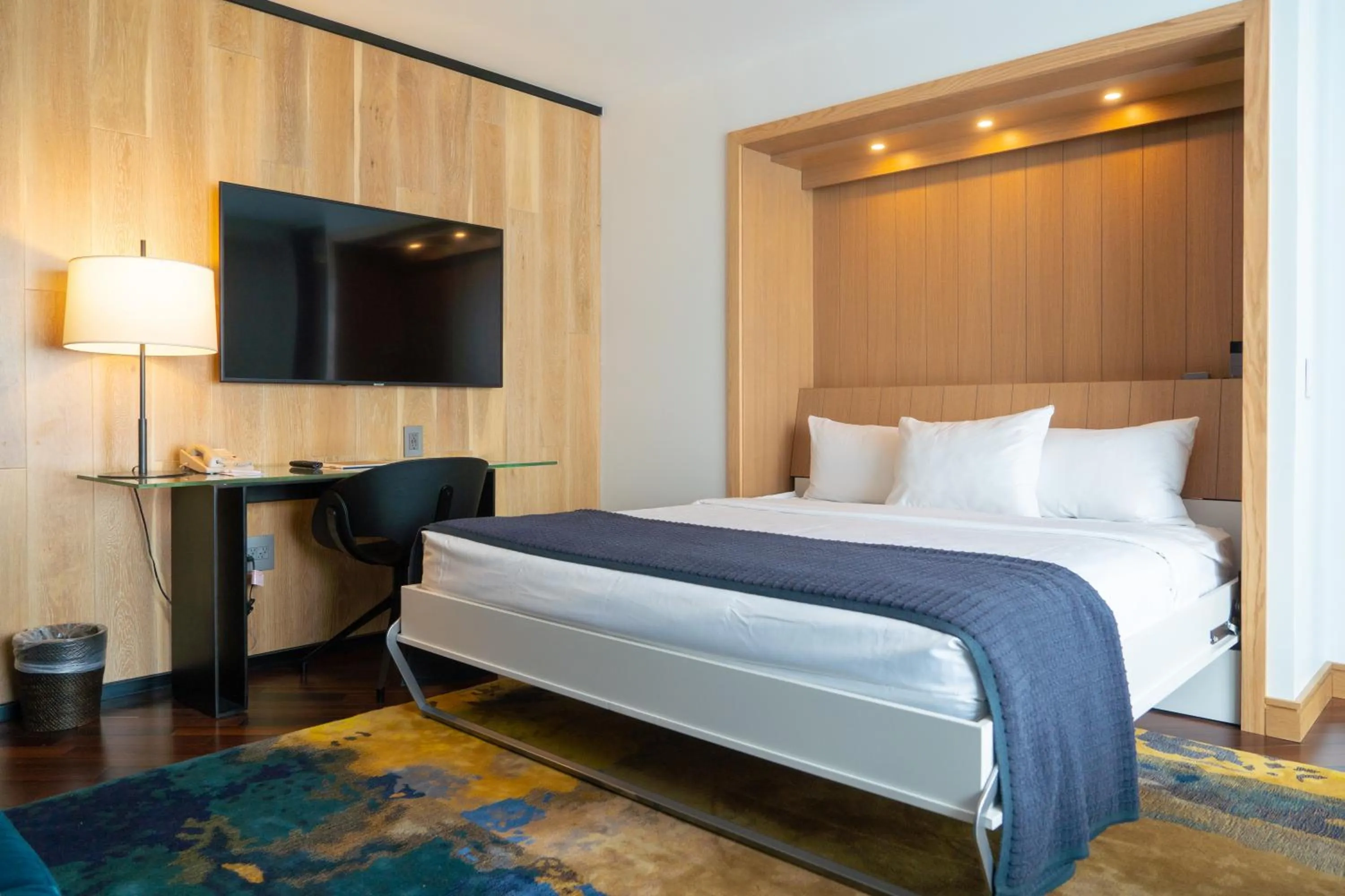 Bed in The Windsor Suites