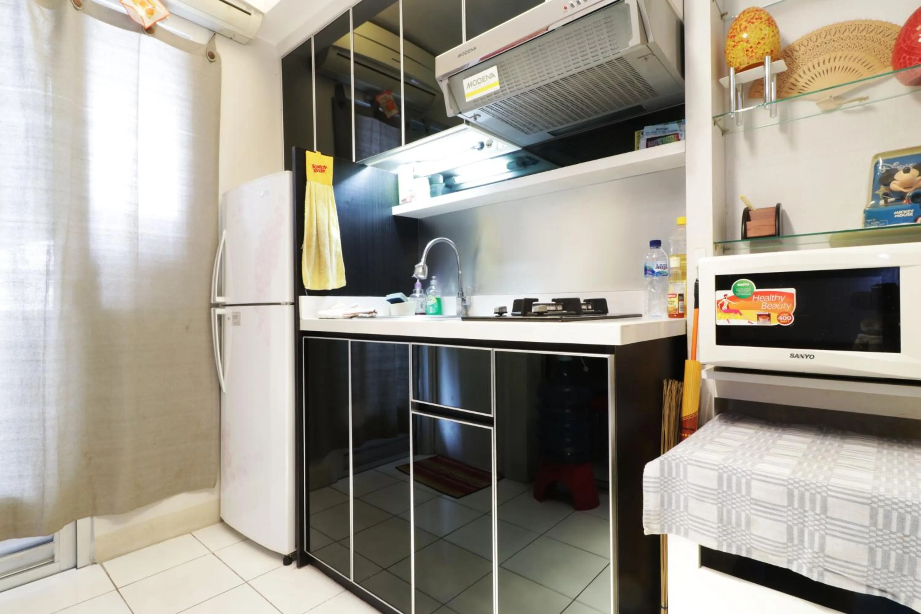 Kitchen or kitchenette in Apartment Kalibata City by Novi
