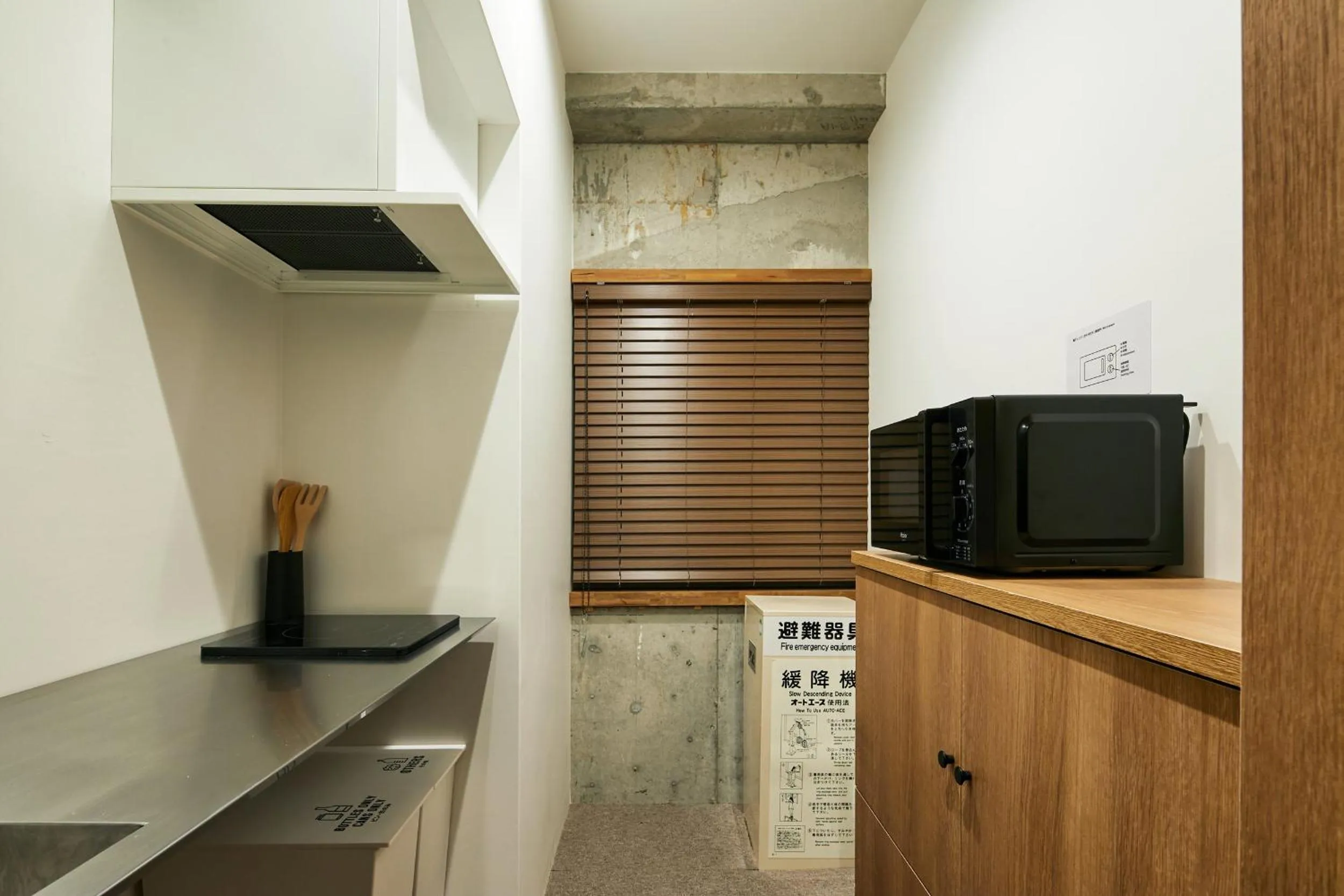 Communal kitchen in mizuka Nakasu 5 - unmanned hotel -