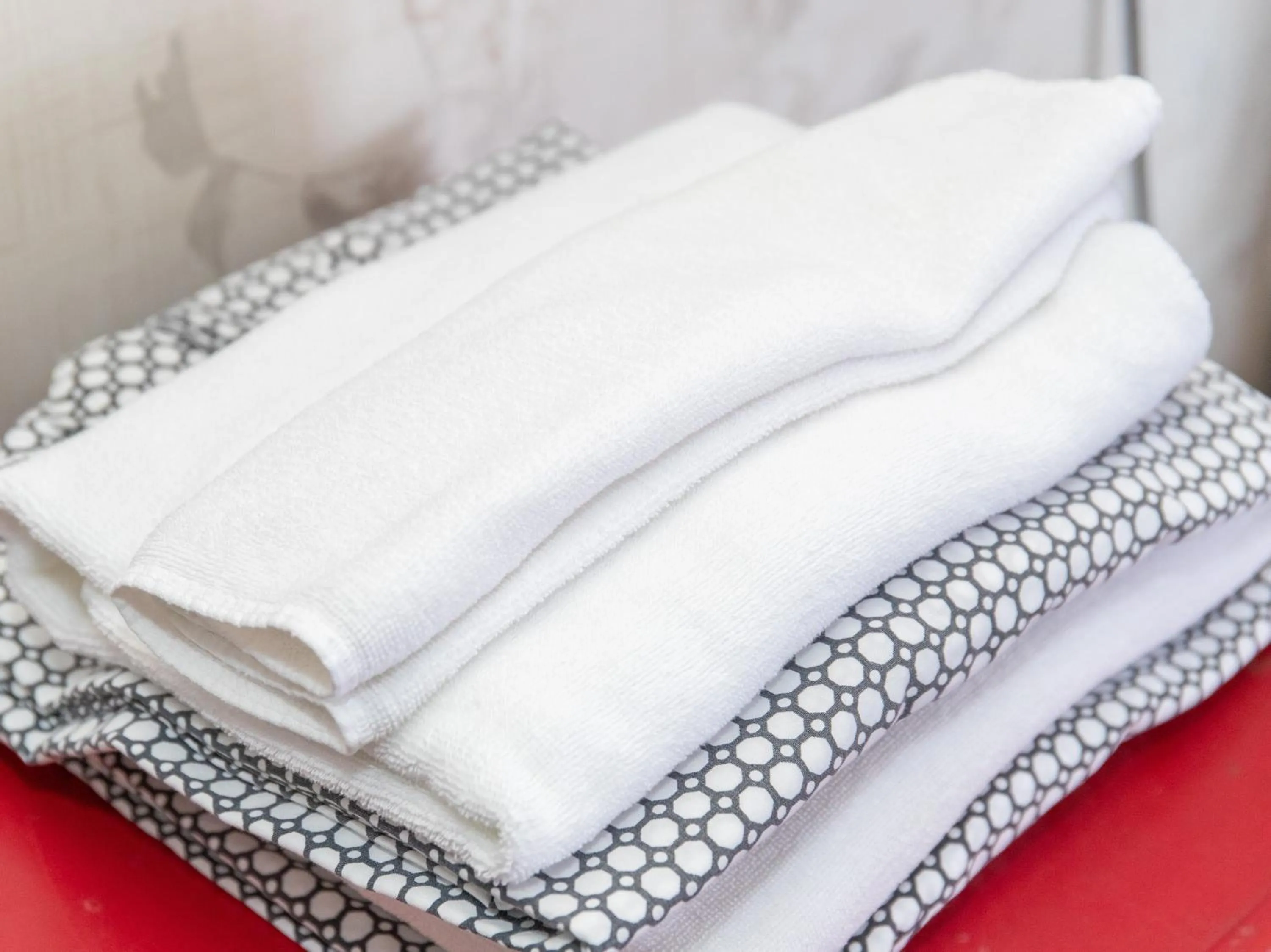 towels, Bed in Tabist Izumi Yusen Shukuhaku Center