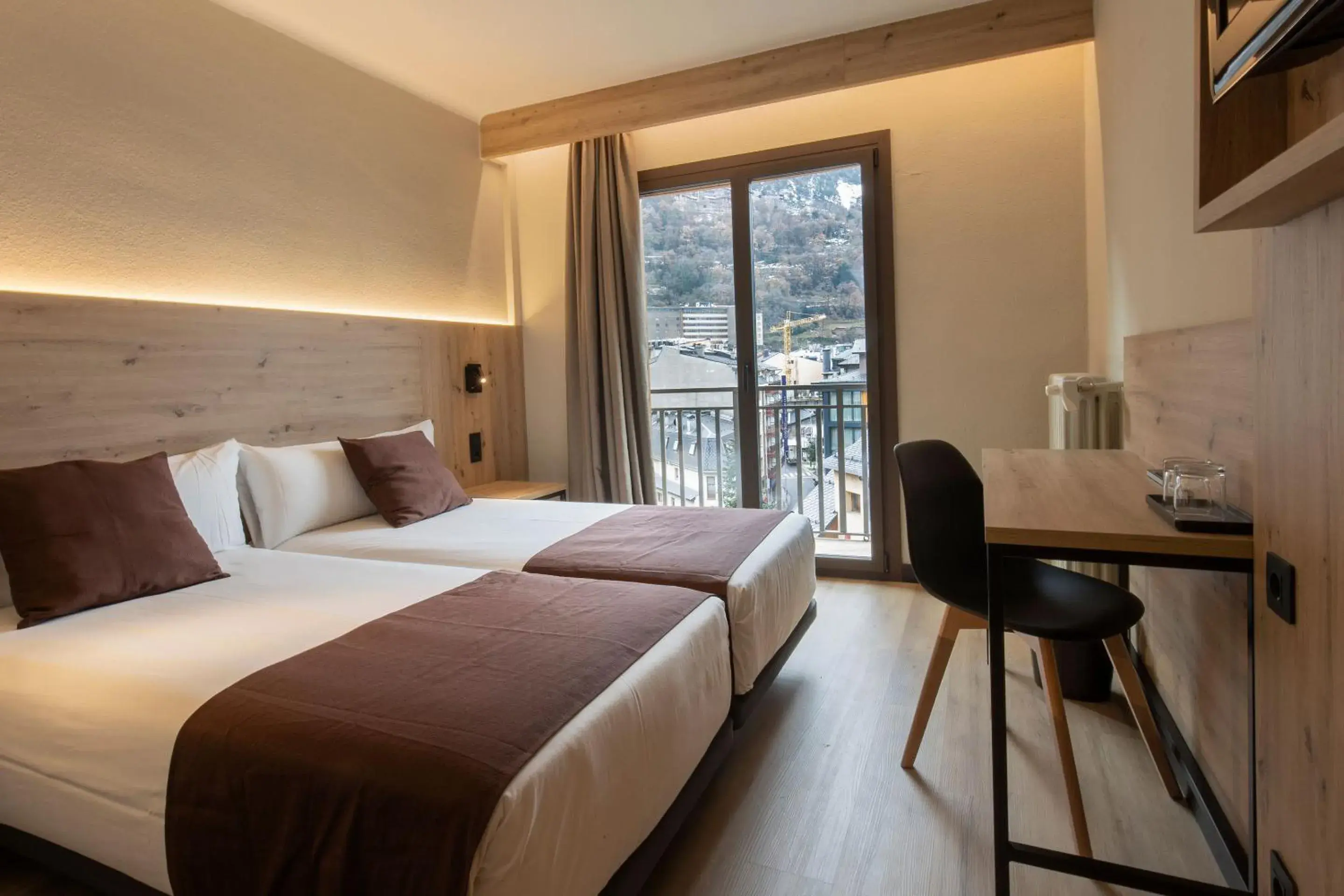 TV and multimedia, Bed in Hotel Comtes d'Urgell by Nexta TV and multimedia, Bed in Hotel Comtes d'Urgell by Nexta